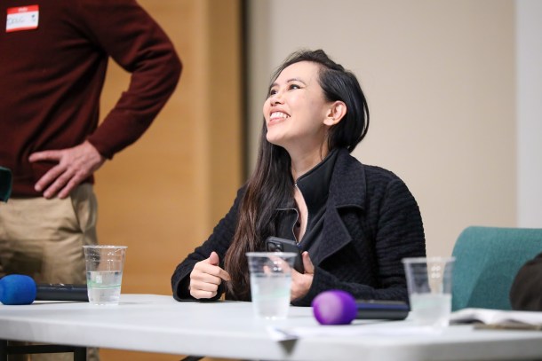 California Public Banking Alliance Executive Director Trinity Tran greets town hall members. Douglas Carter, OBSERVER