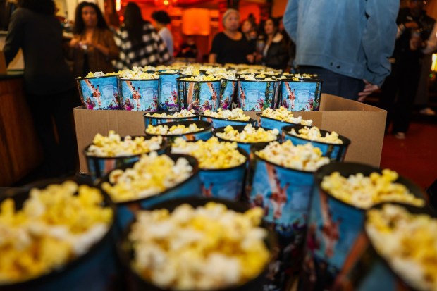 Popcorn in commemorative cups is served before the screening of "GOAT" at the Grand Lake Theater in Oakland, Calif., on Tuesday, Feb. 10, 2026. The film, "GOAT," a story about a young goat trying to make his way into professional sports, was produced by Golden State Warriors star Stephen Curry. (Ray Chavez/Bay Area News Group)