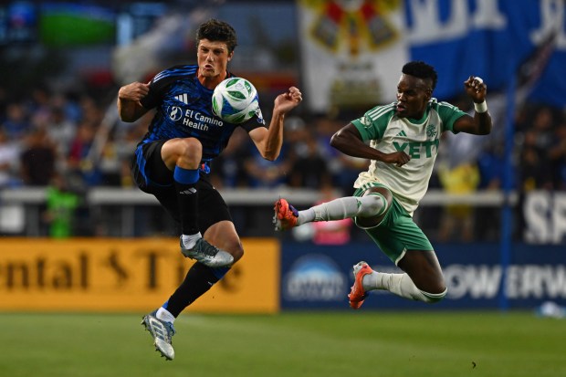 San Jose Earthquakes defender Daniel Munie (5) battles Austin FC forward Jáder Obrian (7) for the ball during the first half of their decision match play at PayPal Park in San Jose, Calif., on Saturday, Oct. 18, 2025. (Jose Carlos Fajardo/Bay Area News Group)