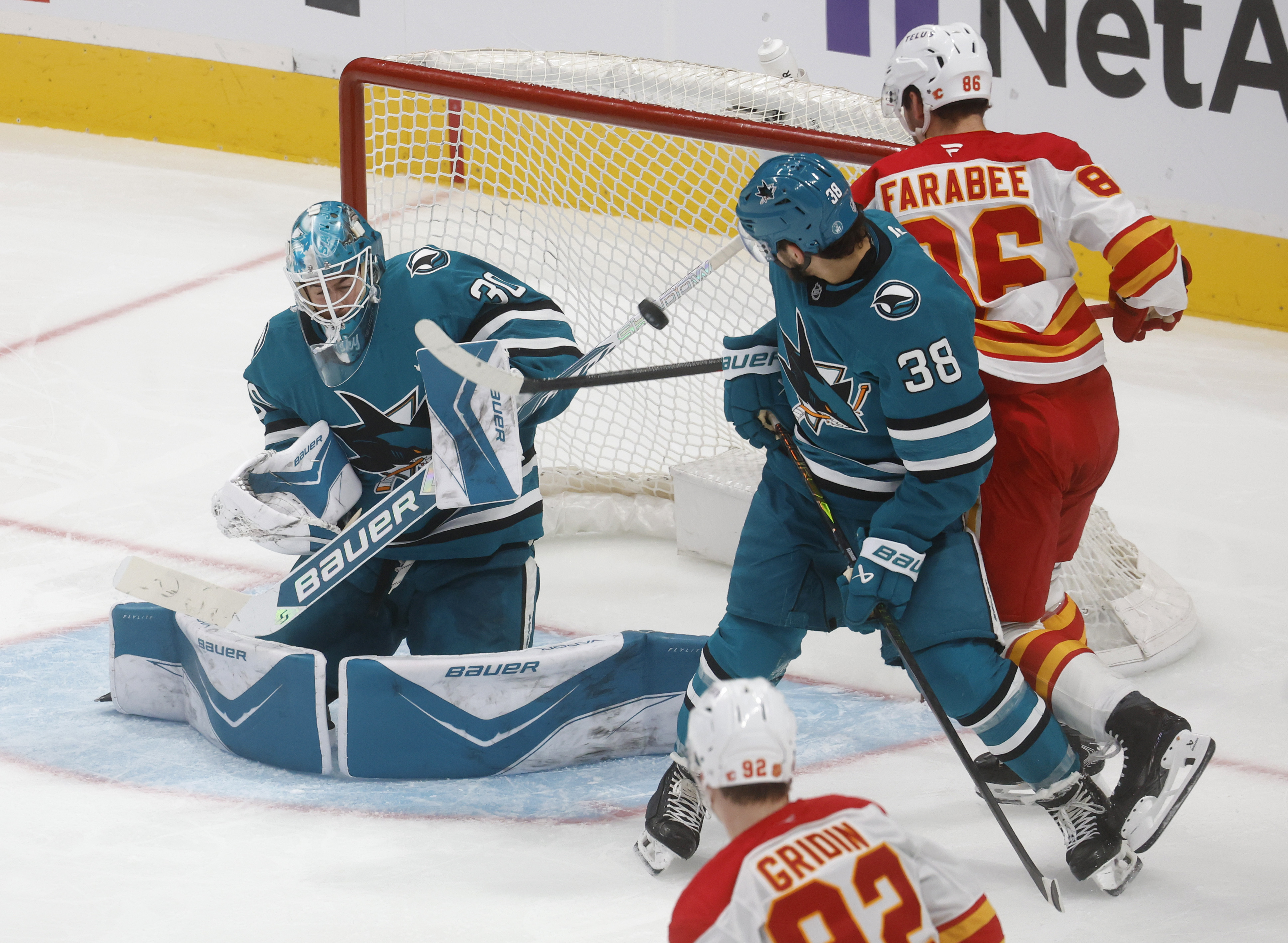 San Jose Sharks goaltender Yaroslav Askarov (30) blocks a shot...