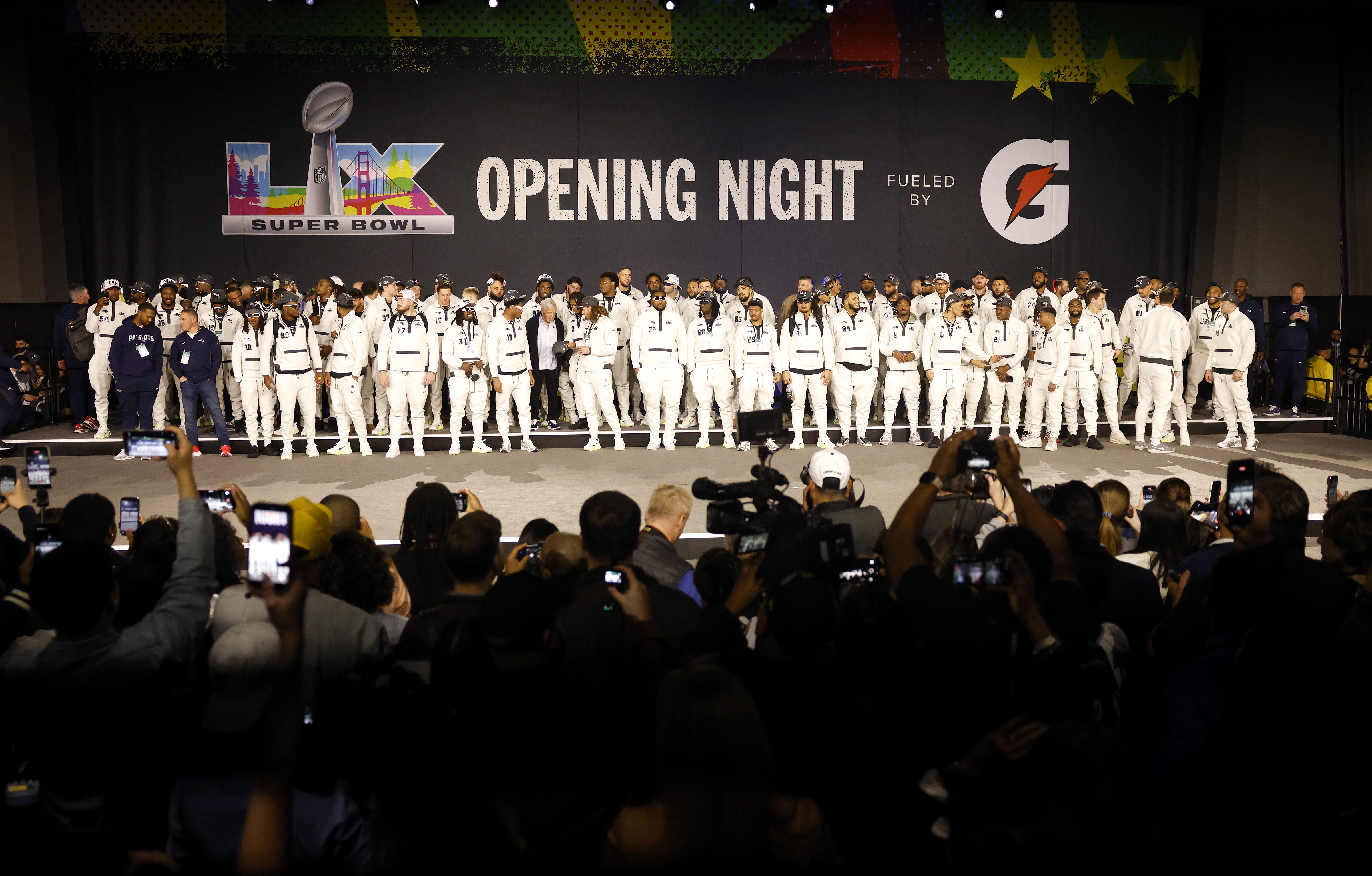 The New England Patriots are introduced during Super Bowl Opening...