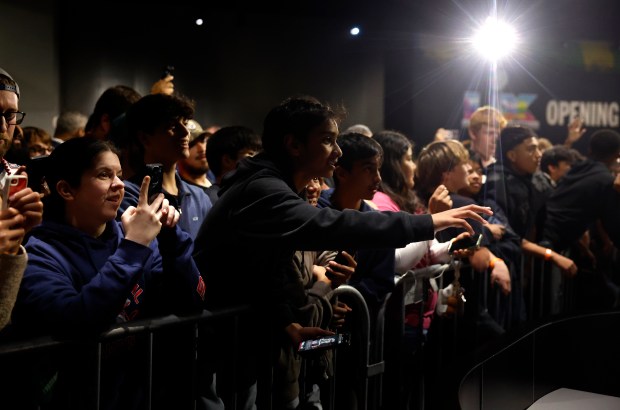 Football fans listen to a New England Patriots player during Super Bowl Opening Night at the San Jose McEnery Convention Center in downtown San Jose, Calif., on Monday, Feb. 2, 2026. (Nhat V. Meyer/Bay Area News Group)