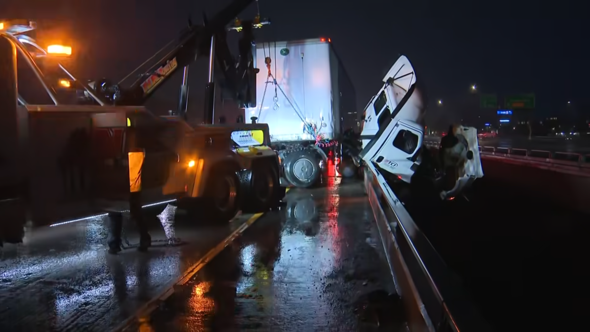 Trucker rescued after I-5 big-rig crash ended with cab dangling 7 stories above river – NBC 7 San Diego