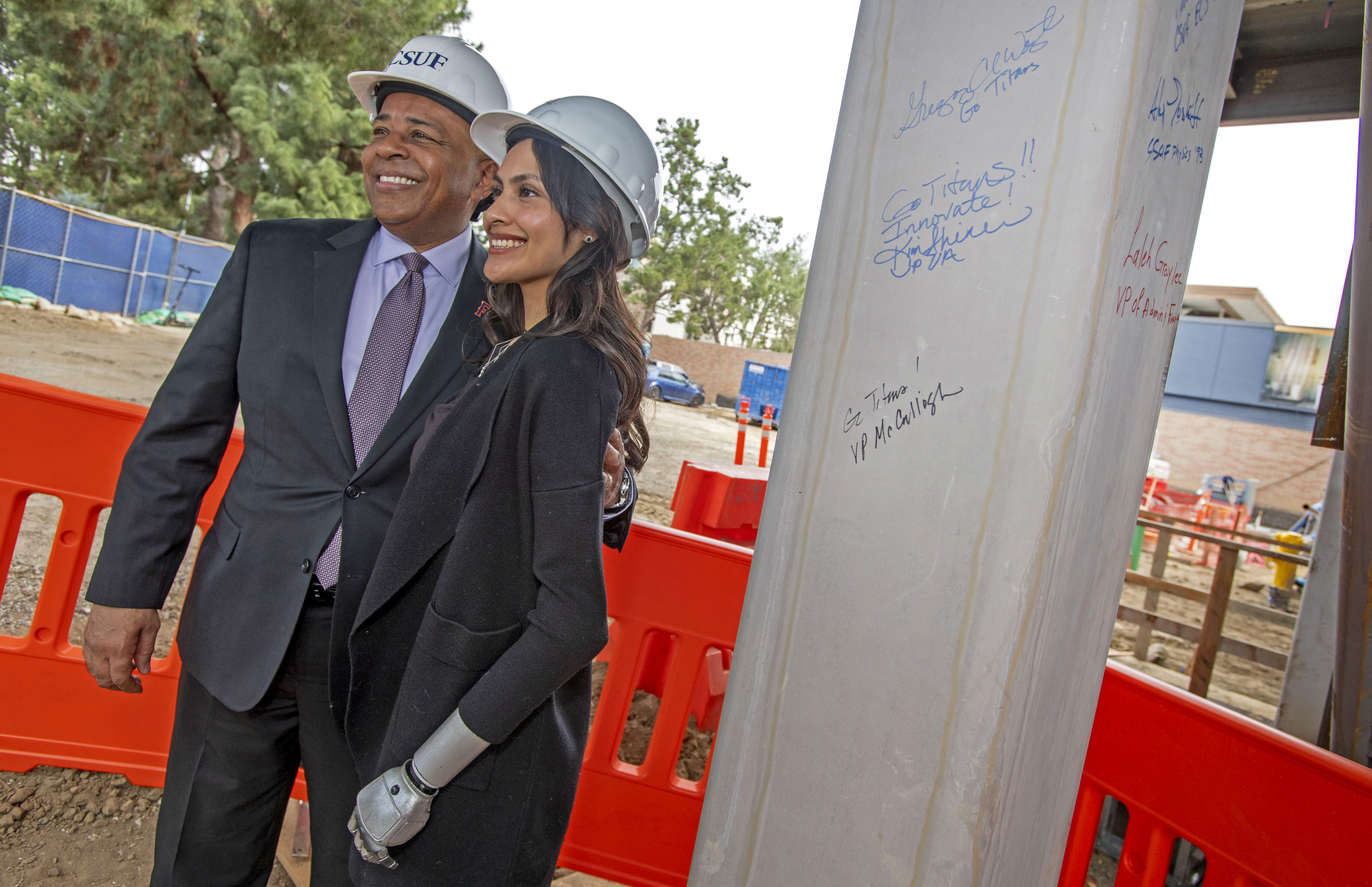 CSUF President Ronald Rochon and mechanical engineering major Haley Barrios...