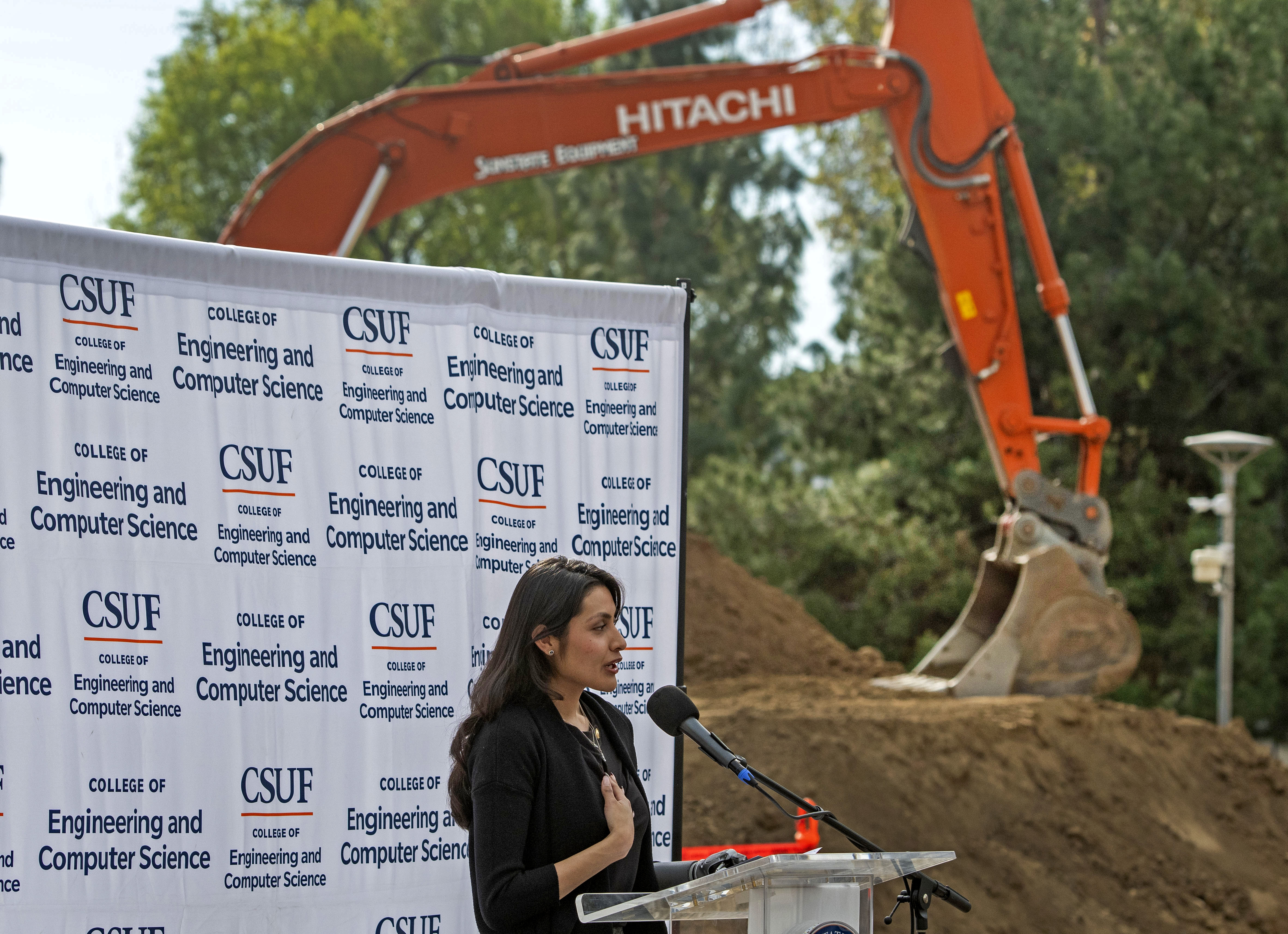 Student representative, Haley Barrios Gomez, a mechanical engineering major, speaks...