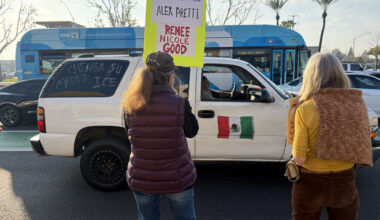 Protestor in SUV drives up and down Herndon and Blackstone blasting Spanish music in solidarity with Anti-ICE demonstration on Feb.7. (Maryanne Casas-Perez/ GV Wire)