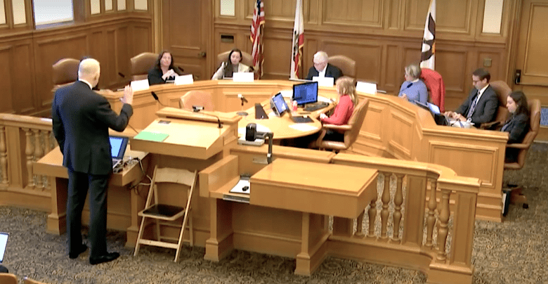 Meeting in government office between 7 task force members