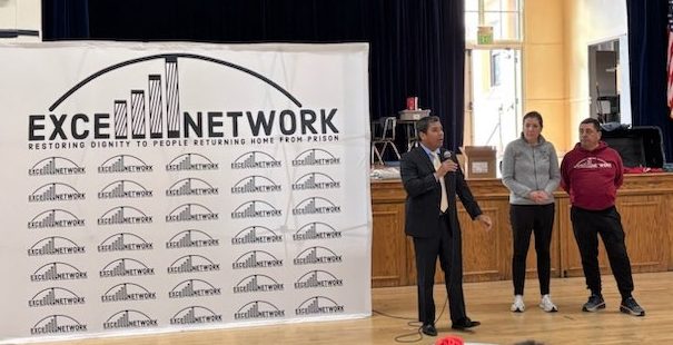 Parole agent speaks at the reentry event with the Archdiocese.