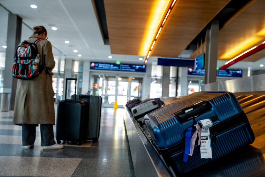 Person waiting for baggage at airport