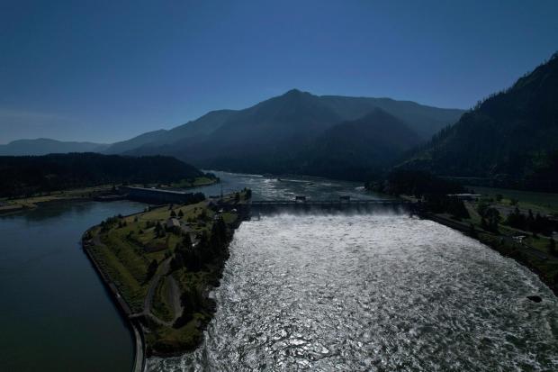 Water spills over the Bonneville Dam on the Columbia River.