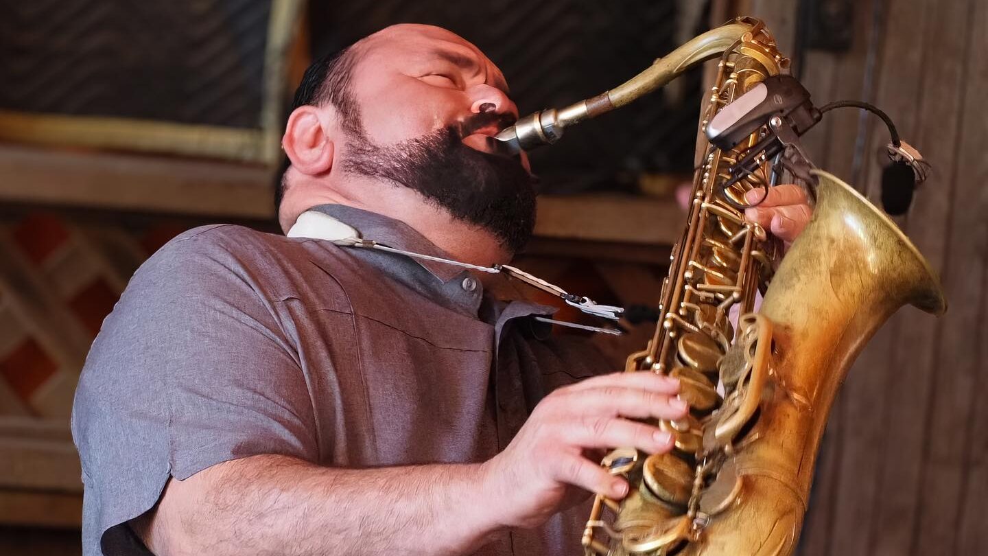 Man plays saxophone