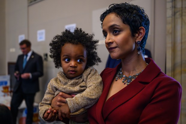 Oakland city councilmember Janani Ramachandran holds her son Nilaan, 1, while attending a press conference celebrating the launch of "Diaper Time is Talk Time" held at Oakland City Hall in Oakland, Calif., on Monday, Feb. 23, 2026. SupplyBank.org and Too Small to Fail launched an exclusive new line of diapers and wipes that will be distributed through nonprofit organizations and public organizations to families in need with young children. (Jose Carlos Fajardo/Bay Area News Group)