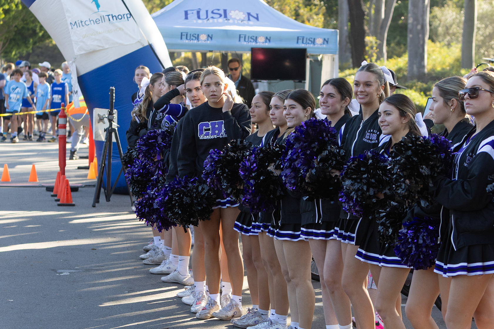The Carlsbad High School Cheer squad came out to encourage...