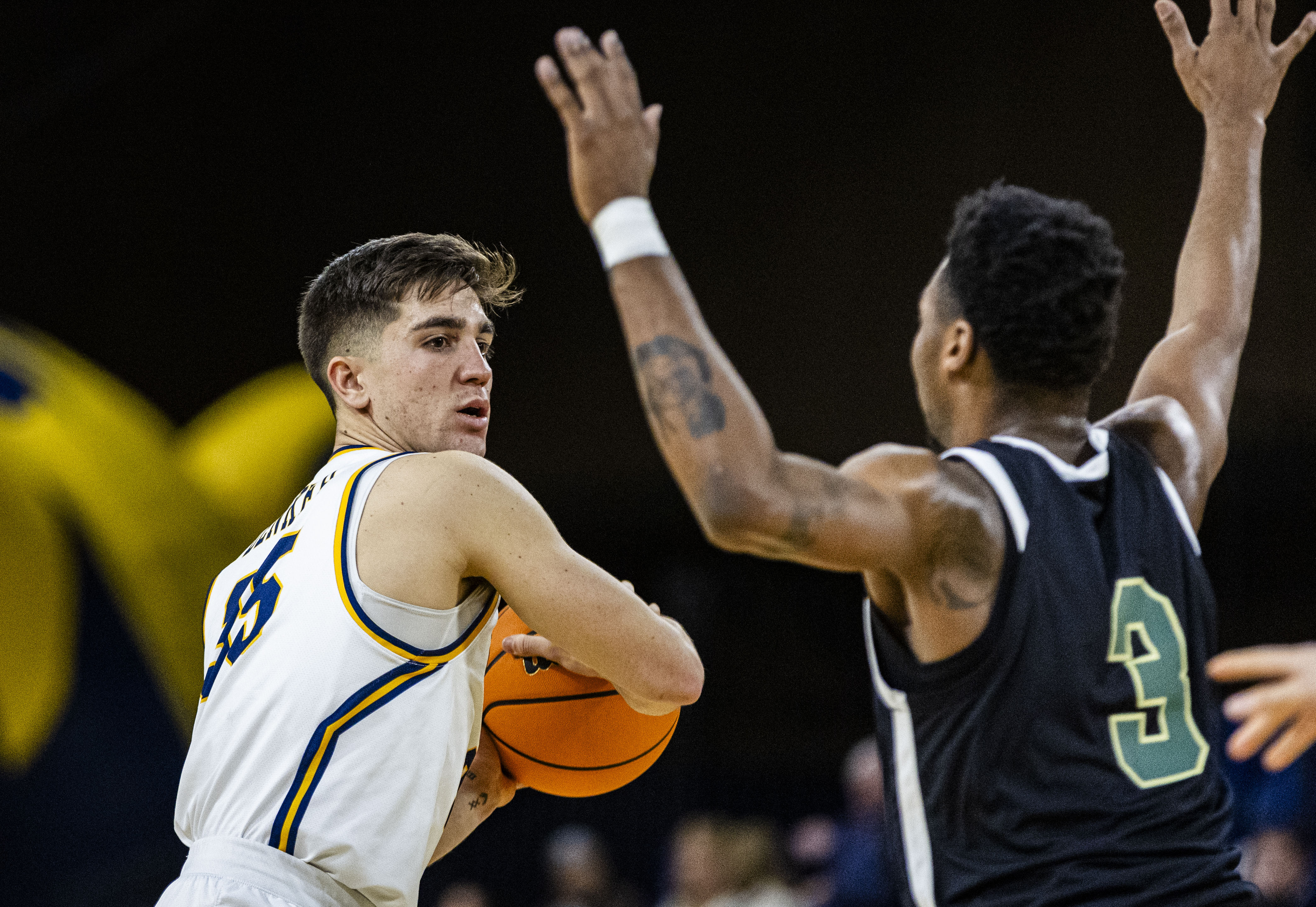 Northern Colorado Bears guard Quinn Denker (35) looks to pass...