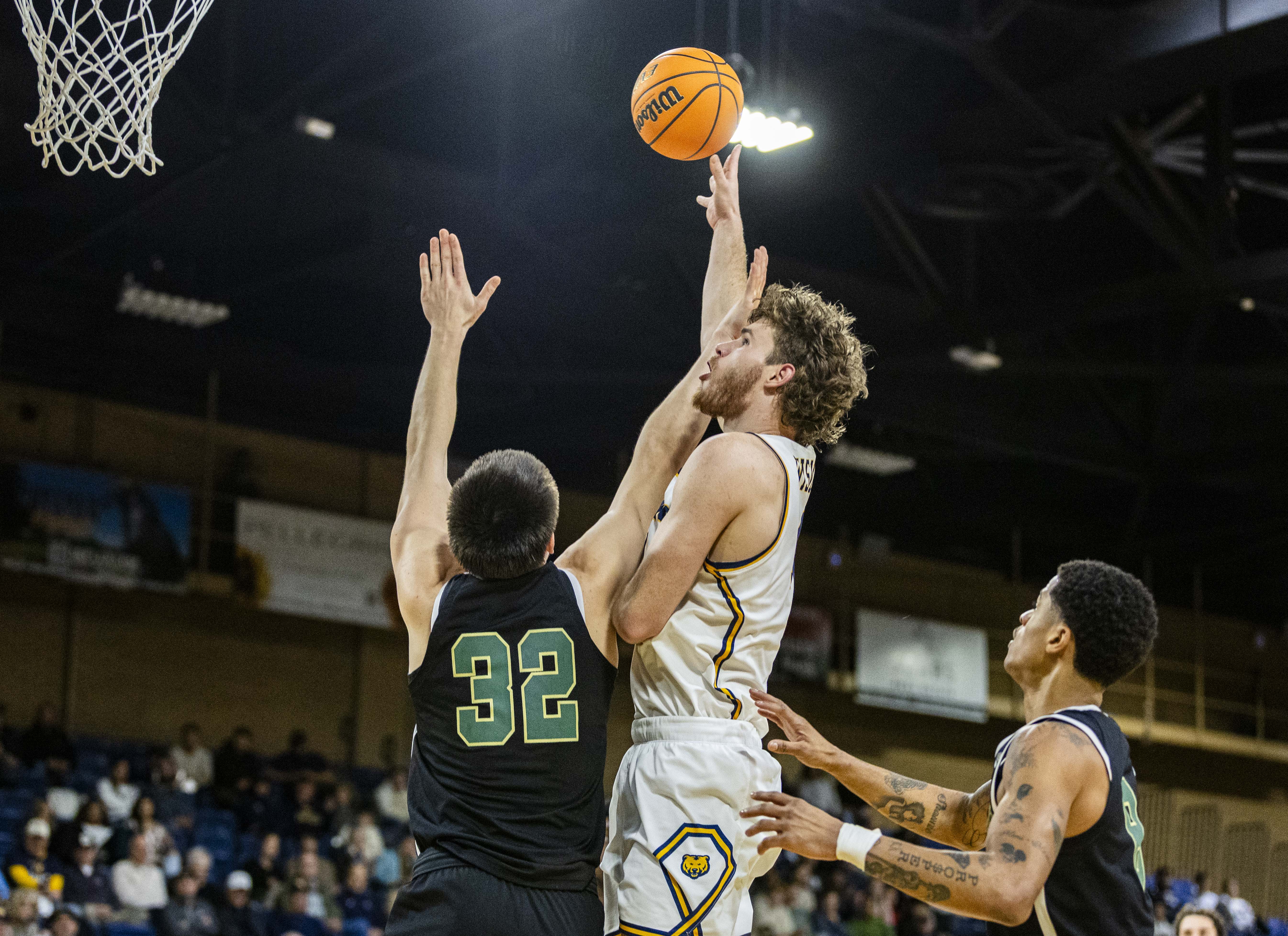 Northern Colorado Bears forward Brock Wisne (14) puts up a...