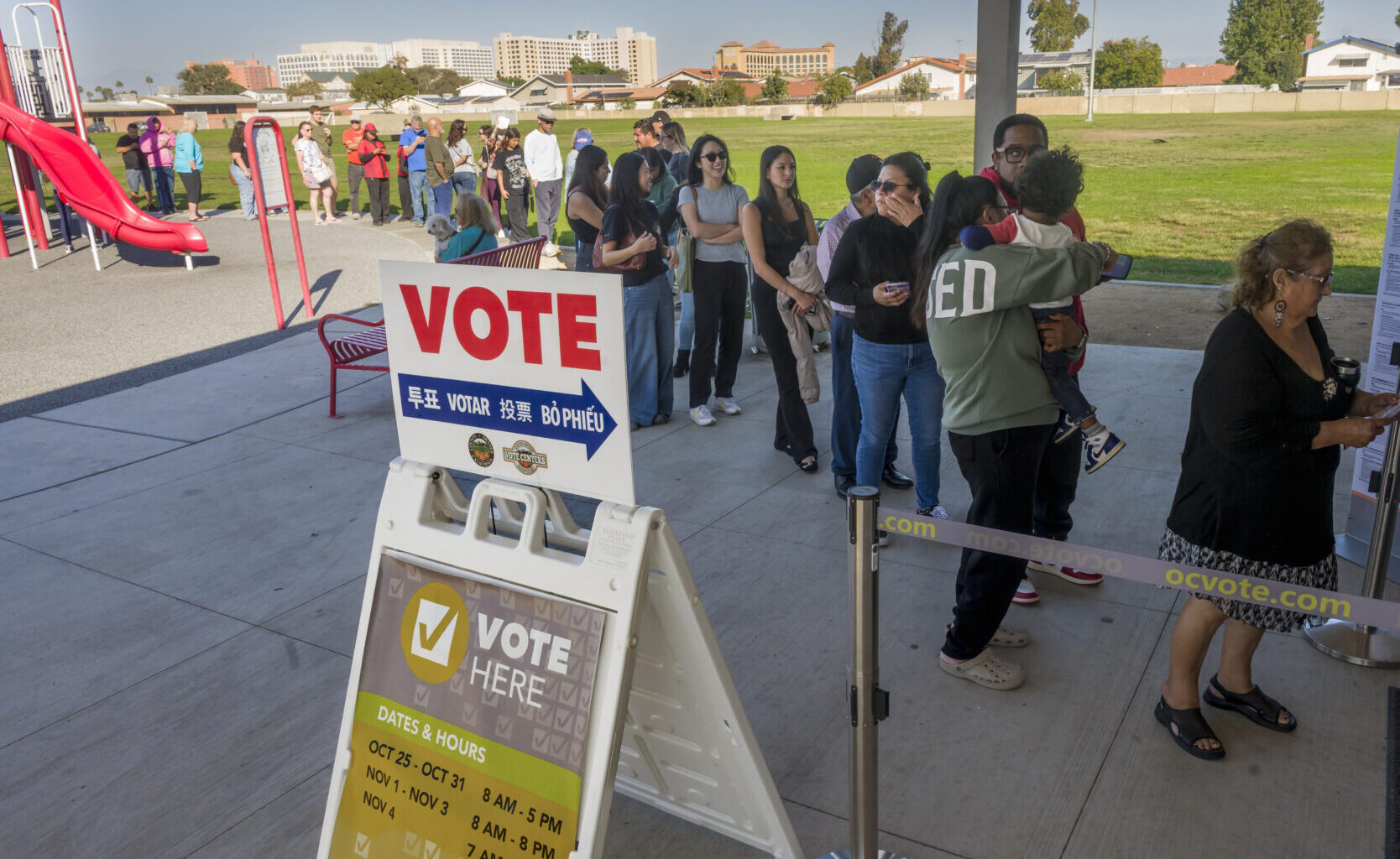 Voters stand in long lines to cast their ballots in the Proposition 50 special election on redistricting in Garden Grove, Calif., on Tuesday, Nov. 4, 2025.