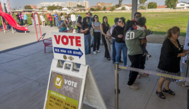 Voters stand in long lines to cast their ballots in the Proposition 50 special election on redistricting in Garden Grove, Calif., on Tuesday, Nov. 4, 2025.