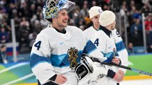 Goalkeeper Juuse Saros of Finland celebrates victory during the Ice Hockey Men's Bronze Medal Game match between Slovakia and Finland.