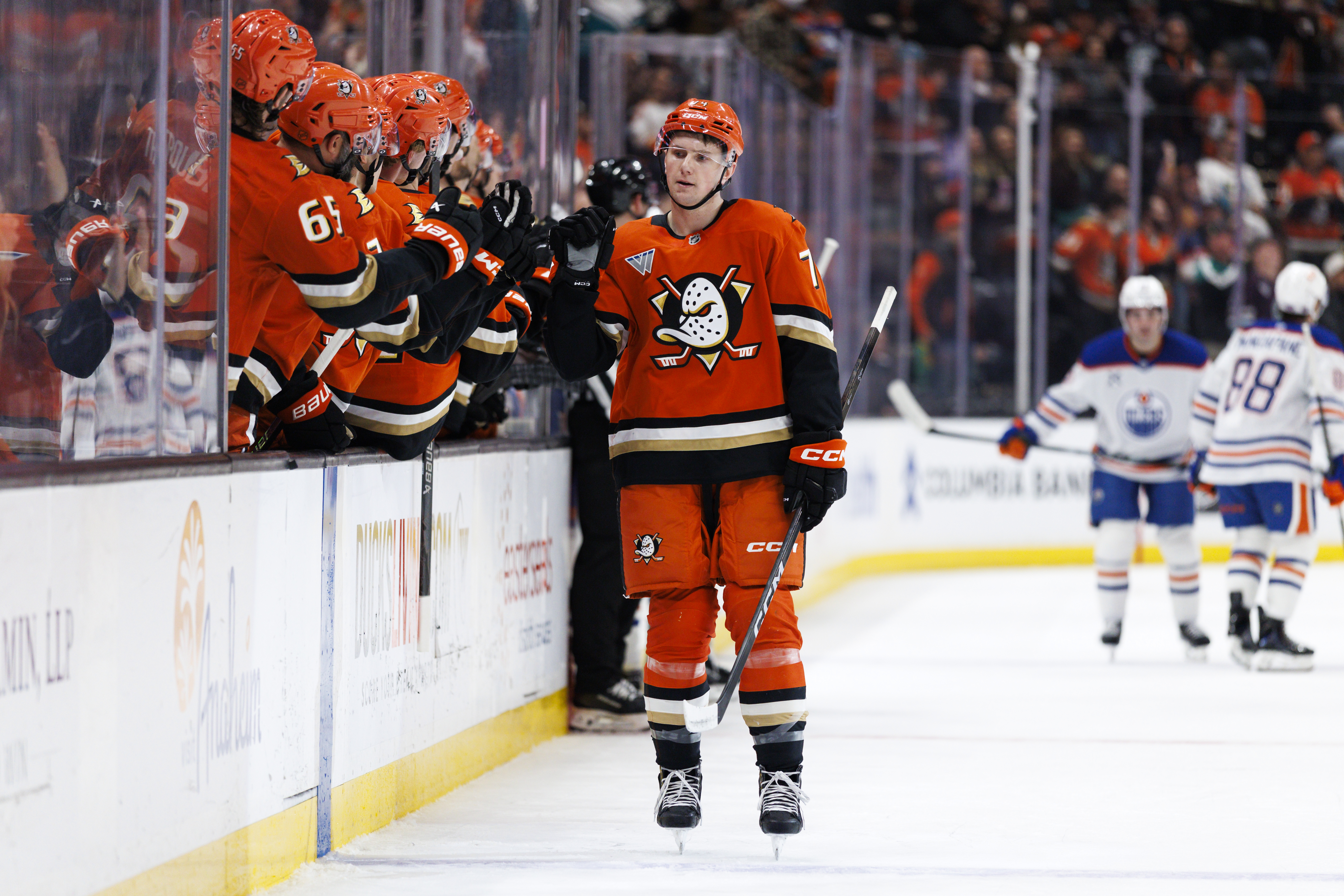 The Ducks’ Ian Moore celebrates his goal with teammates on...