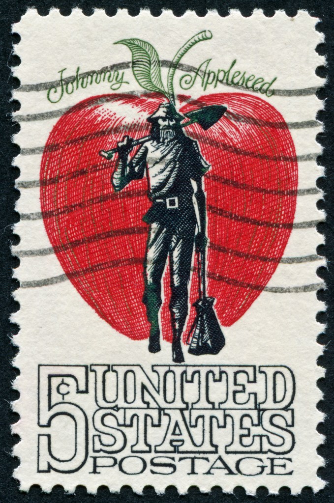 Canceled 5-cent stamp featuring an apple and Johnny Appleseed