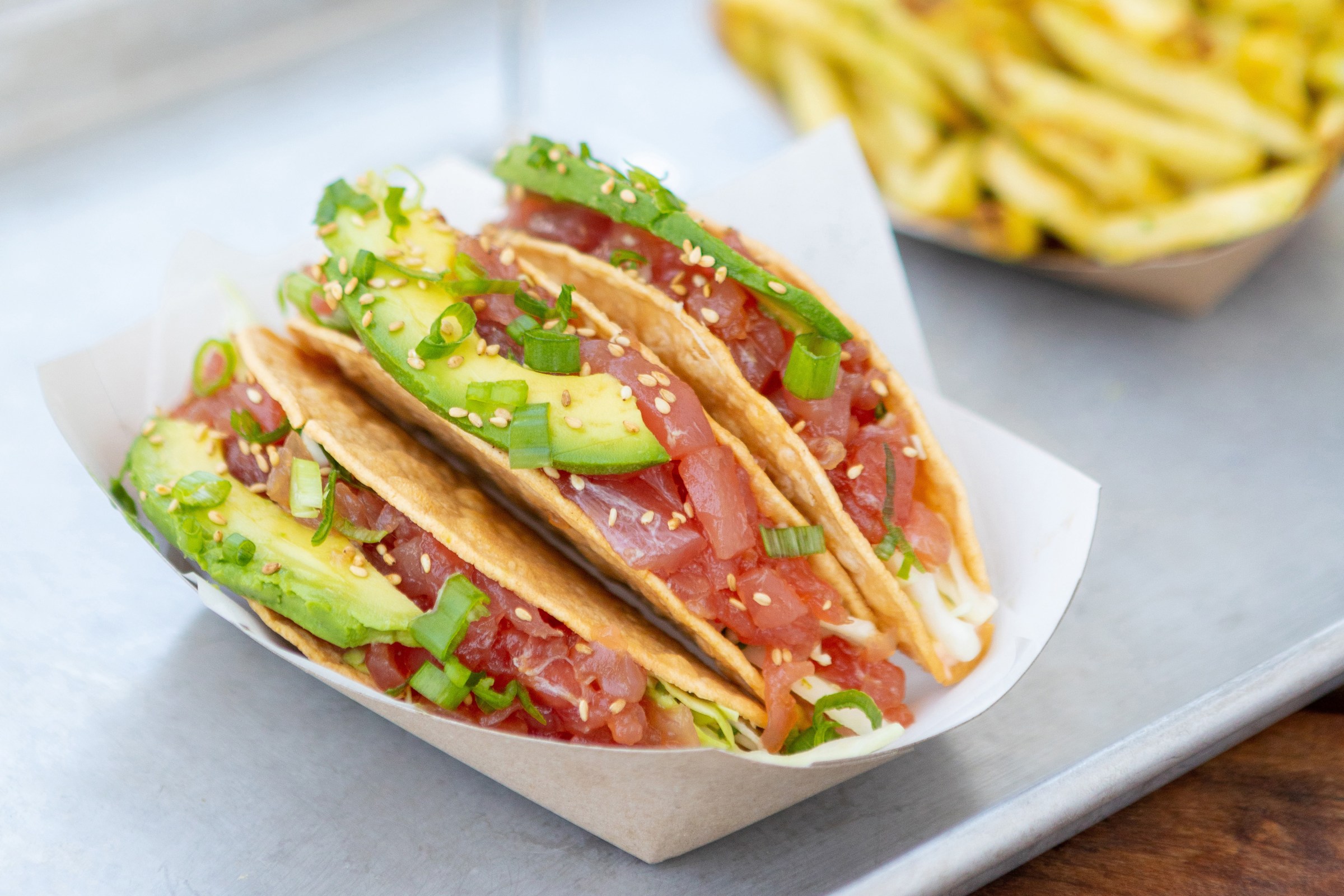 Three crispy-shelled tacos with ahi tuna at Gott’s.