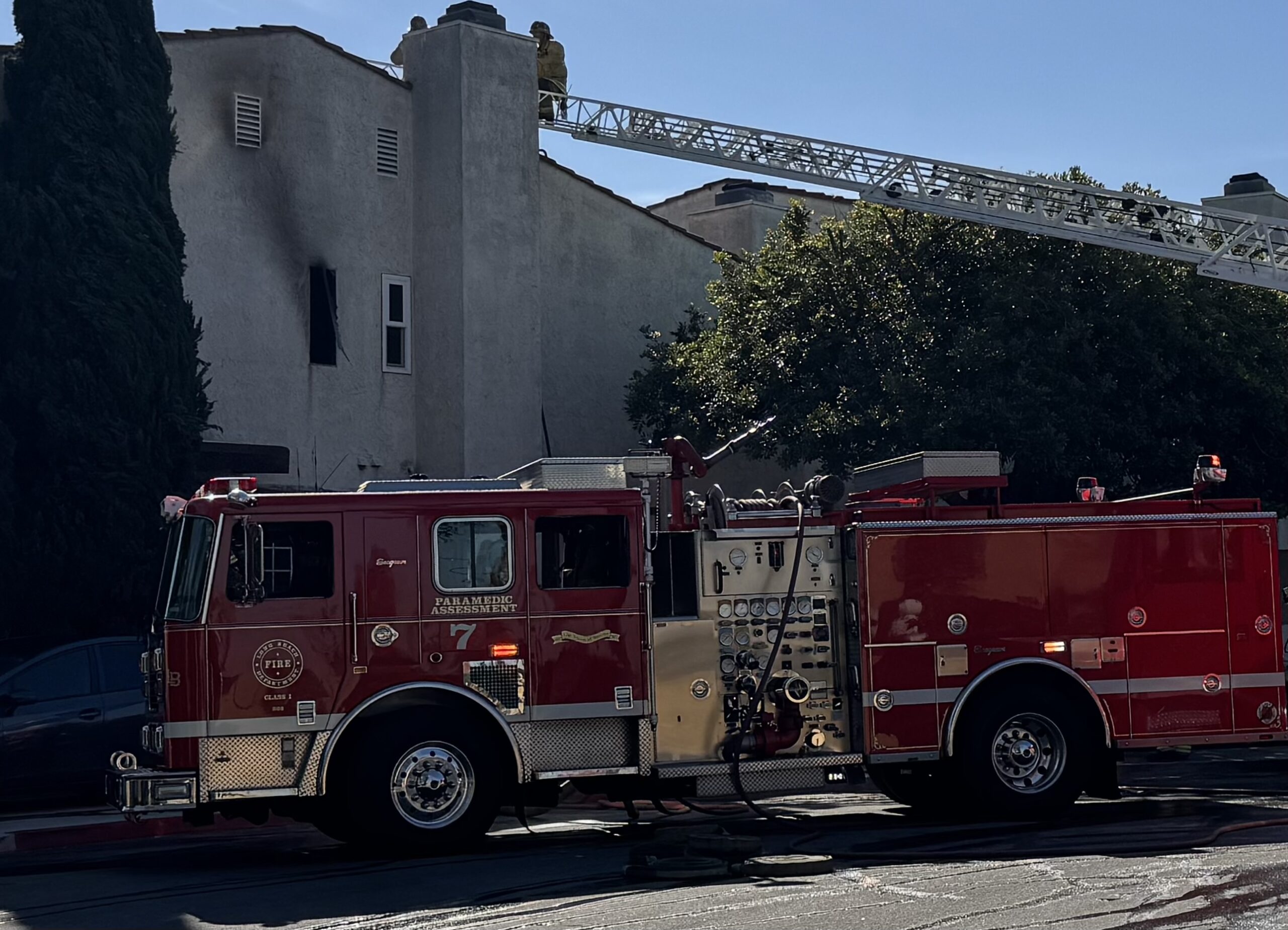 Civilians Save Woman Hanging From 2nd-Story Window in Long Beach Apartment Fire