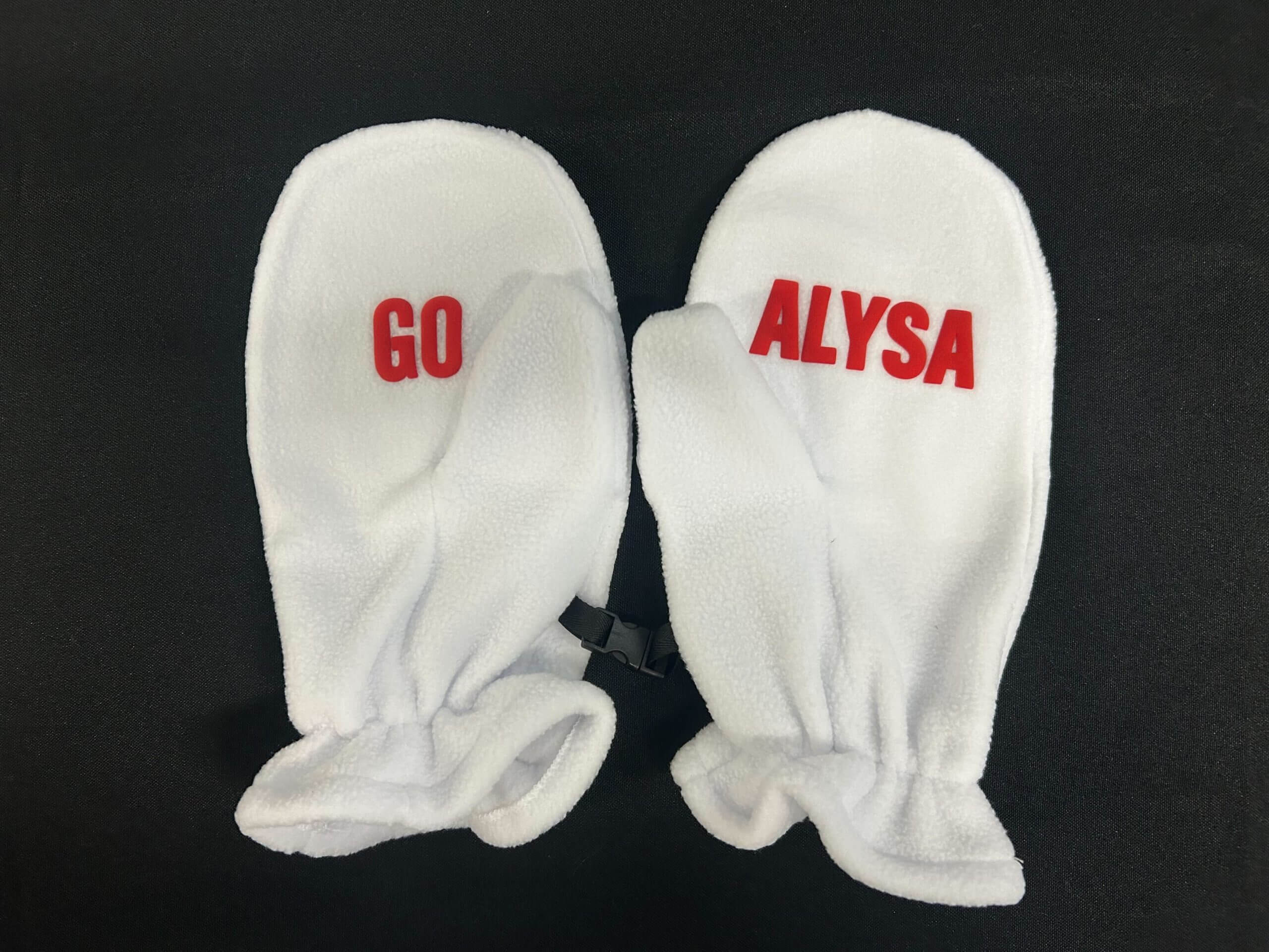White gloves reading "Go Alysa."