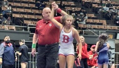 Marcia Nunez of Buchanan has her hand raised after placing first at the Central Section Masters at Selland Arena on Saturday, Feb. 21, 2026.