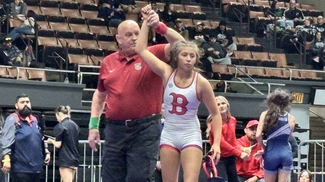 Marcia Nunez of Buchanan has her hand raised after placing first at the Central Section Masters at Selland Arena on Saturday, Feb. 21, 2026.