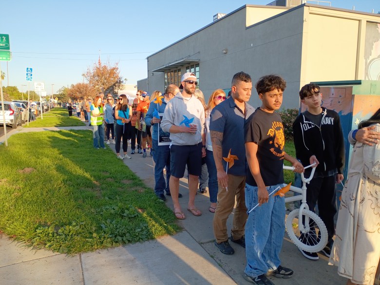 People gather for the memorial for Hudson O'Loughlin, 6, who was killed in a Pacific Beach car crash. (Photo by Dave Schwab/Times of San Diego)