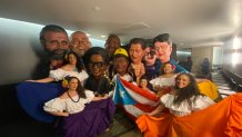 Backstage at the 2023 Grammy Awards, Jade Power-Sotomayor (bottom left in the purple skirt) prepared to take the stage with Bad Bunny, performing "plena," a traditional Puerto Rican drum-dance form.