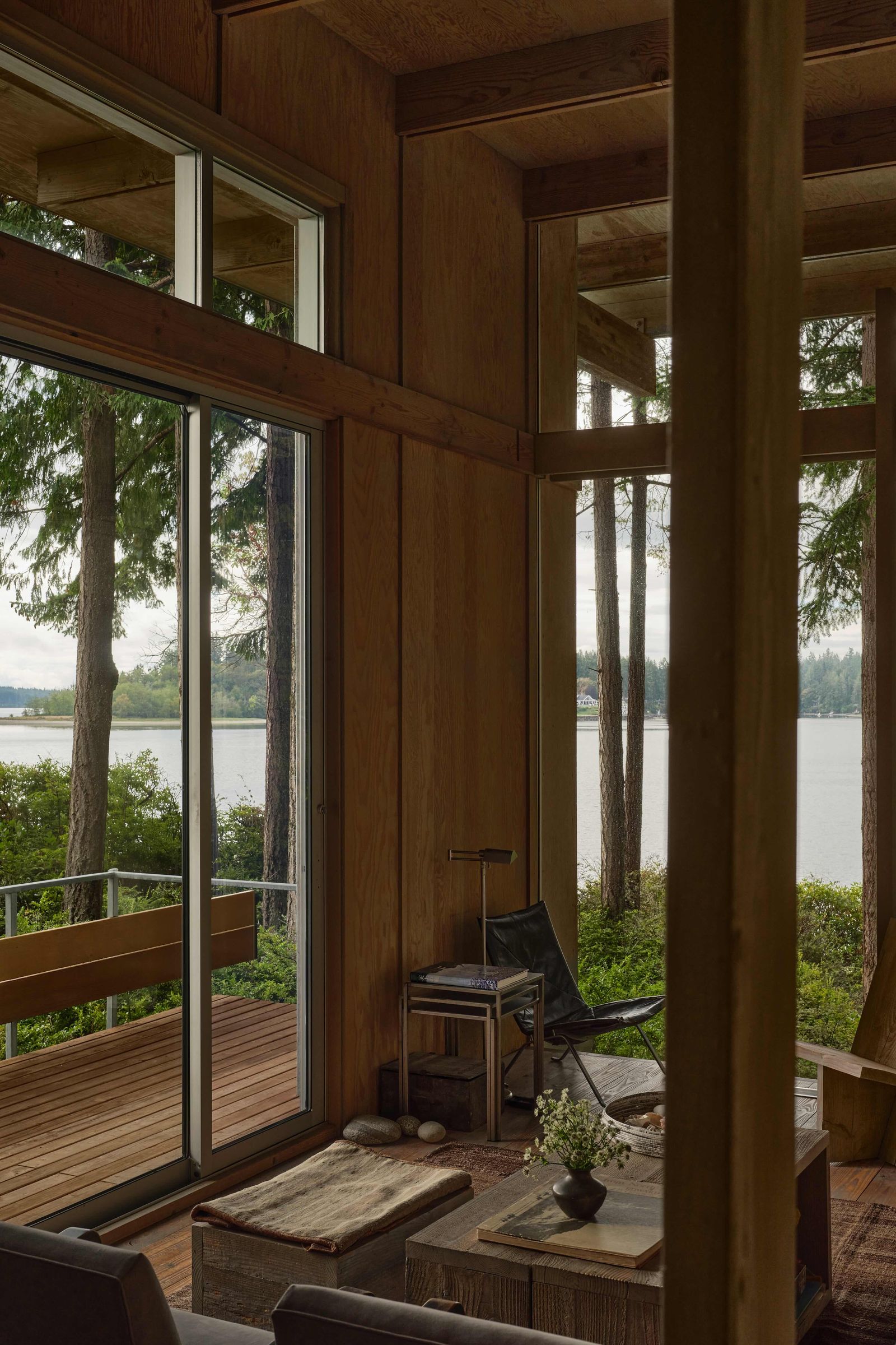 Image may contain Indoors Interior Design Plant Nature Outdoors Scenery Wood Hardwood Stained Wood and Chair