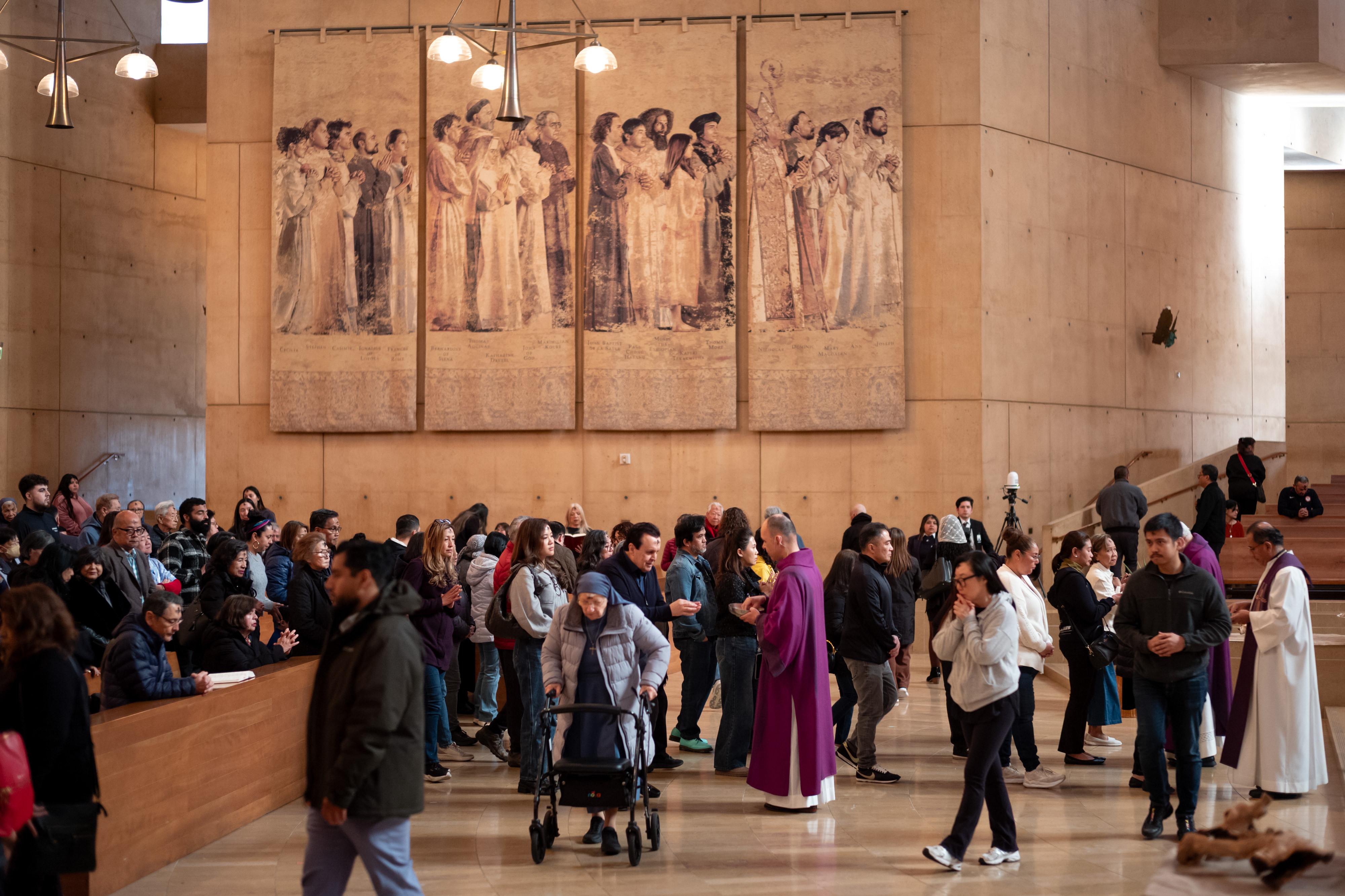 Parishioners celebrate Ash Wednesday Mass at the Cathedral of Our...