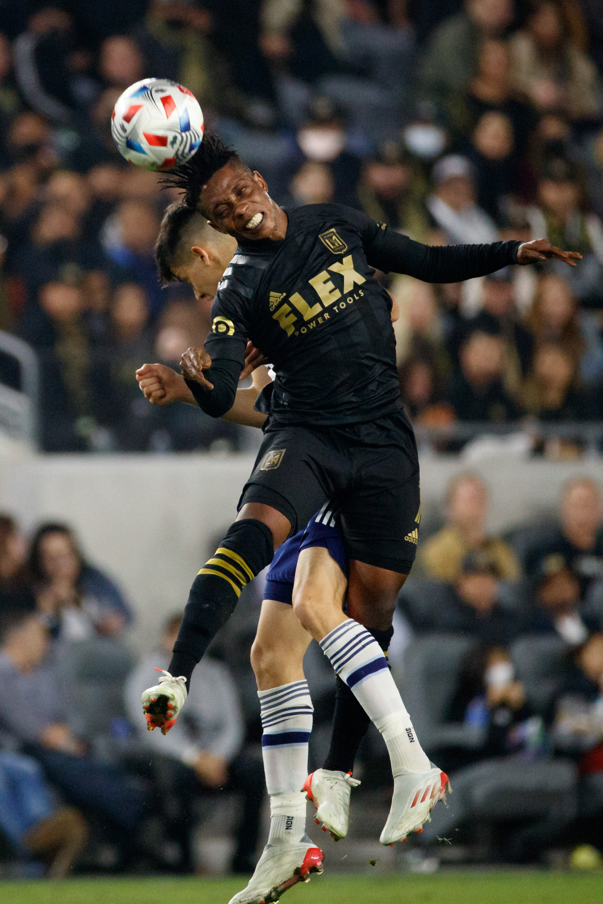LAFC forward Latif Blessing heads the ball during the second...
