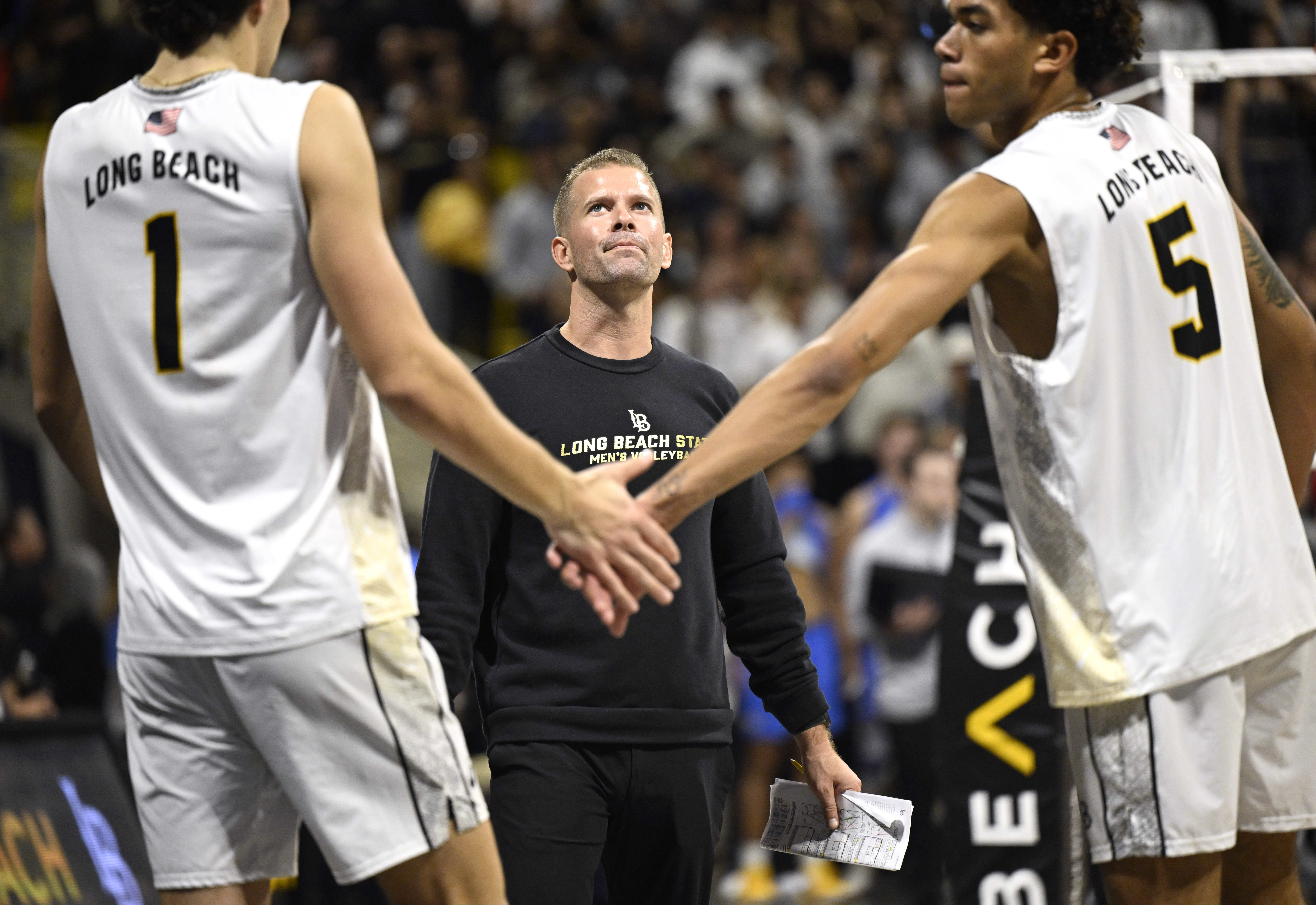 Long Beach State men’s volleyball head coach Nick MacRae looks...