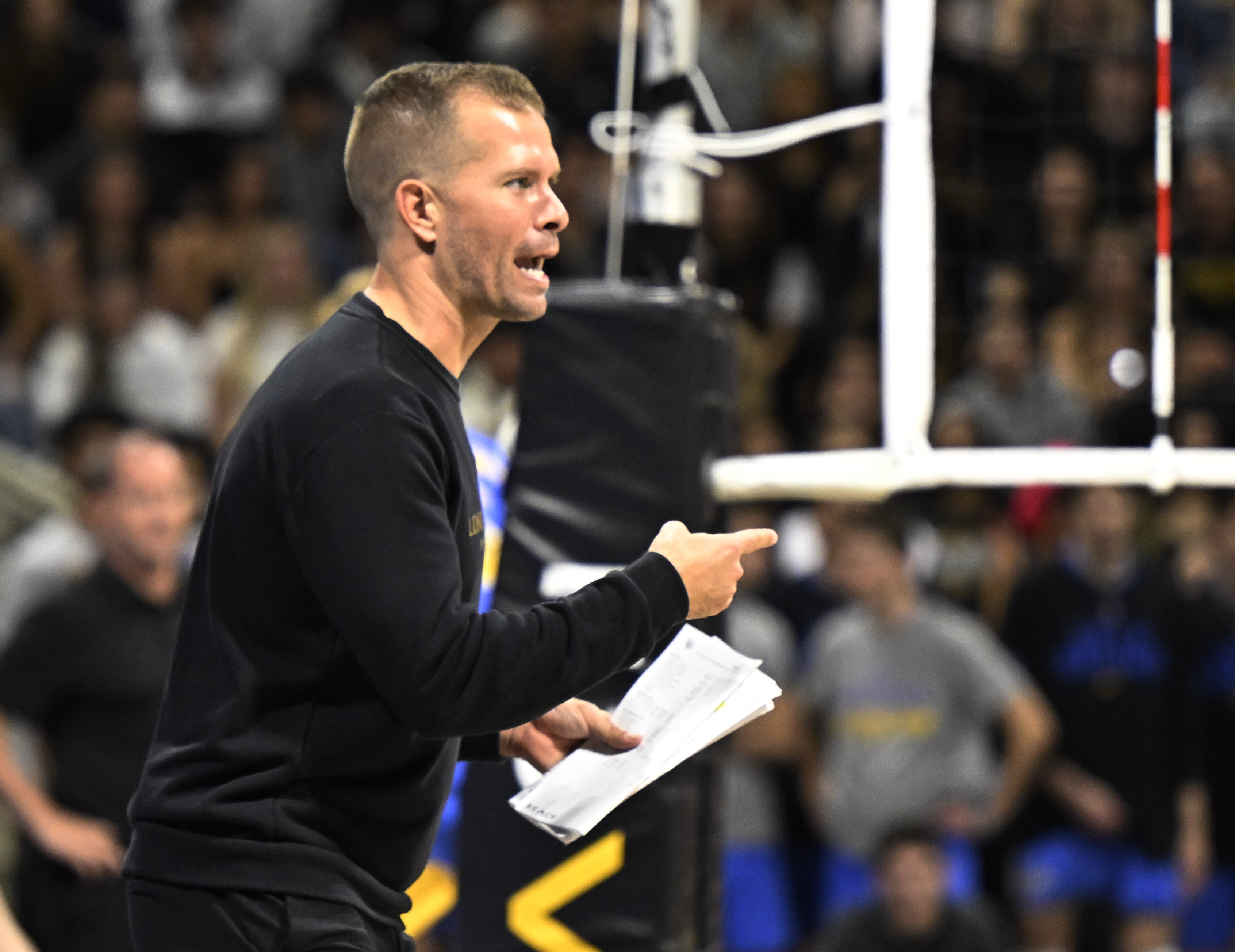 Long Beach State men’s volleyball head coach Nick MacRae looks...