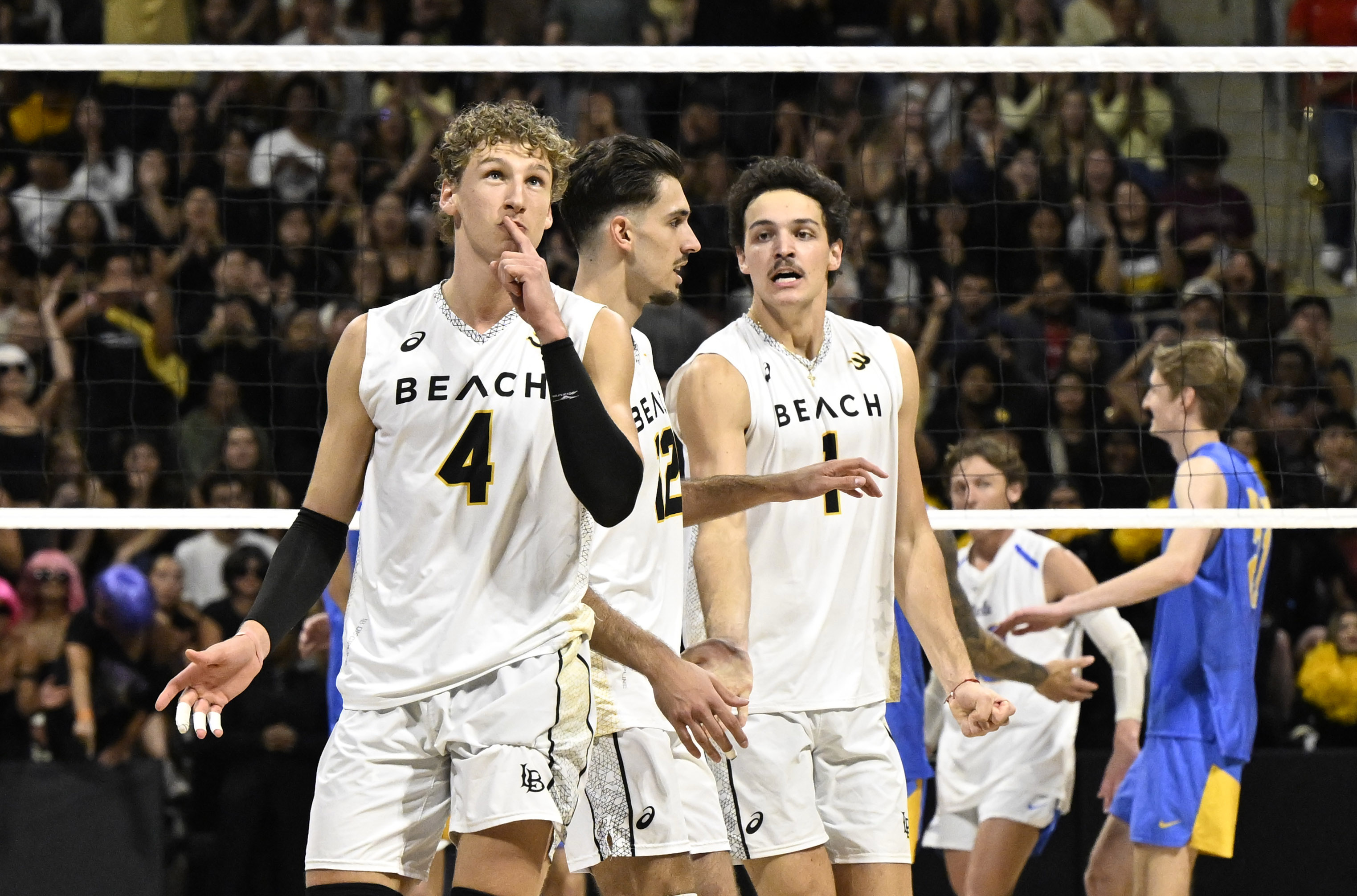 Long Beach State outside hitter Skyler Varga (4) reacts after...