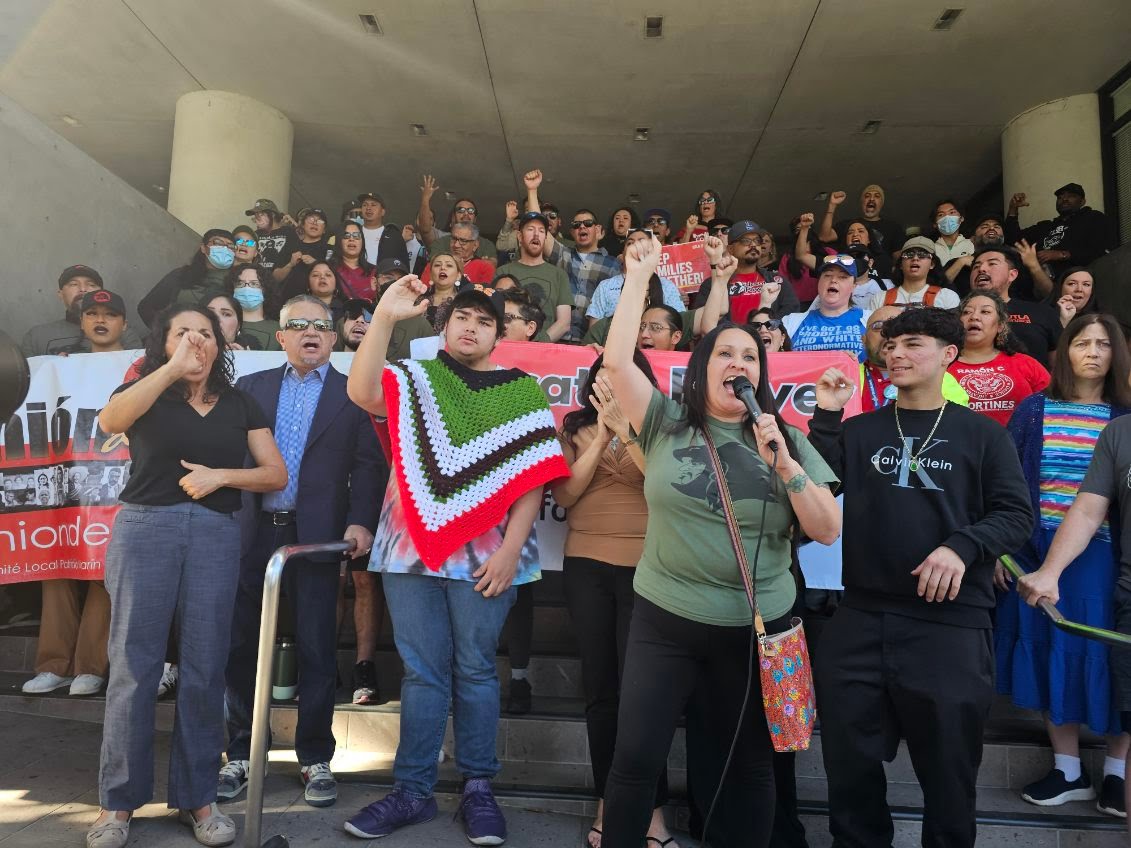 Lupe Cardona, an LAUSD teacher and organizer, leads attendees in...