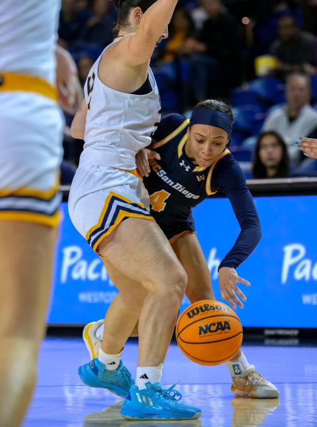 UC San Diego guard Makayla Rose, right, tries to get around UC Irvine guard Shirel Nahum during a Big West game on Saturday, Jan. 24, 2026, at UCI's Bren Events Center. (Photo by Paul Rodriguez, Contributing Photographer)