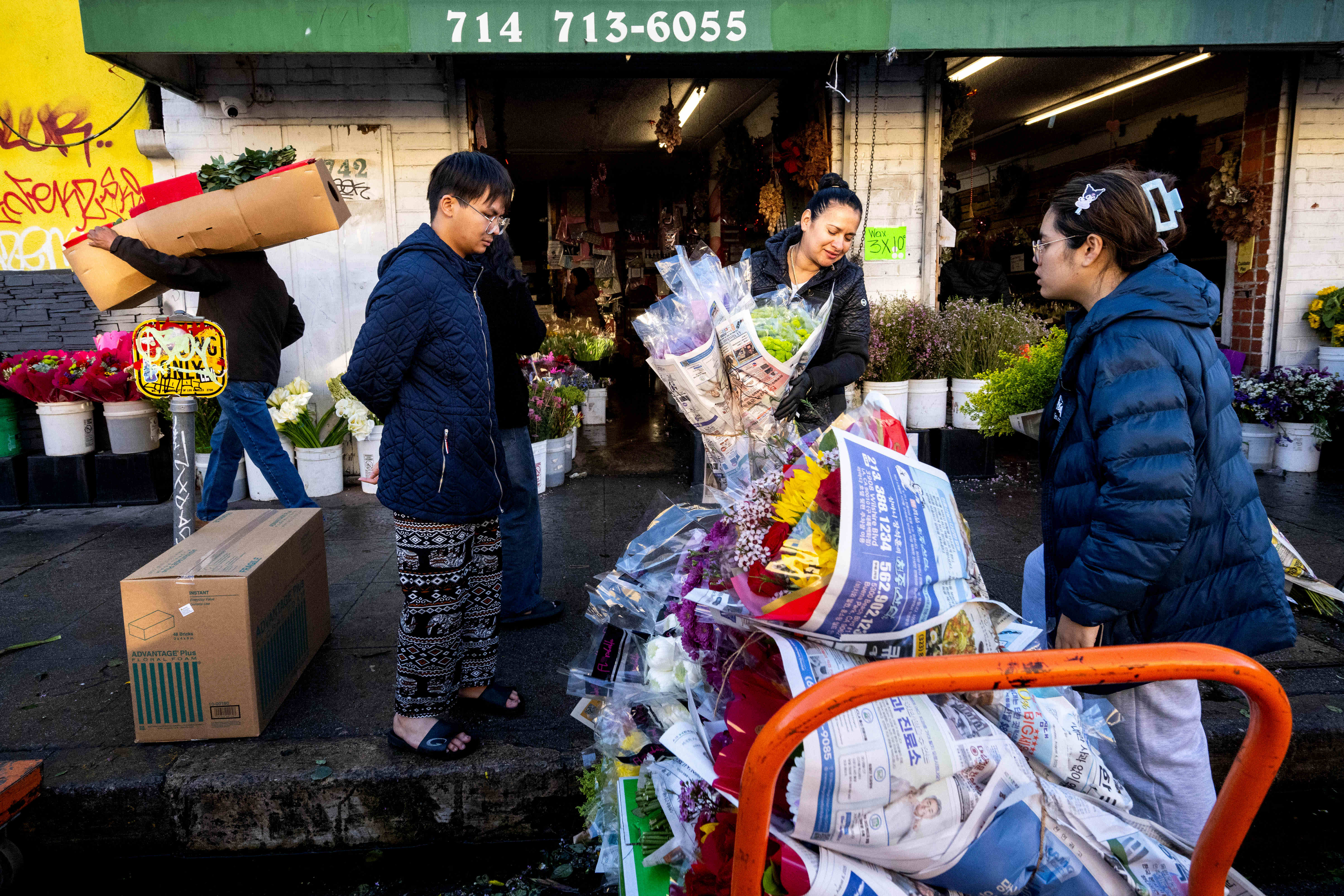 People shop for flowers in the Los Angeles Flower District...