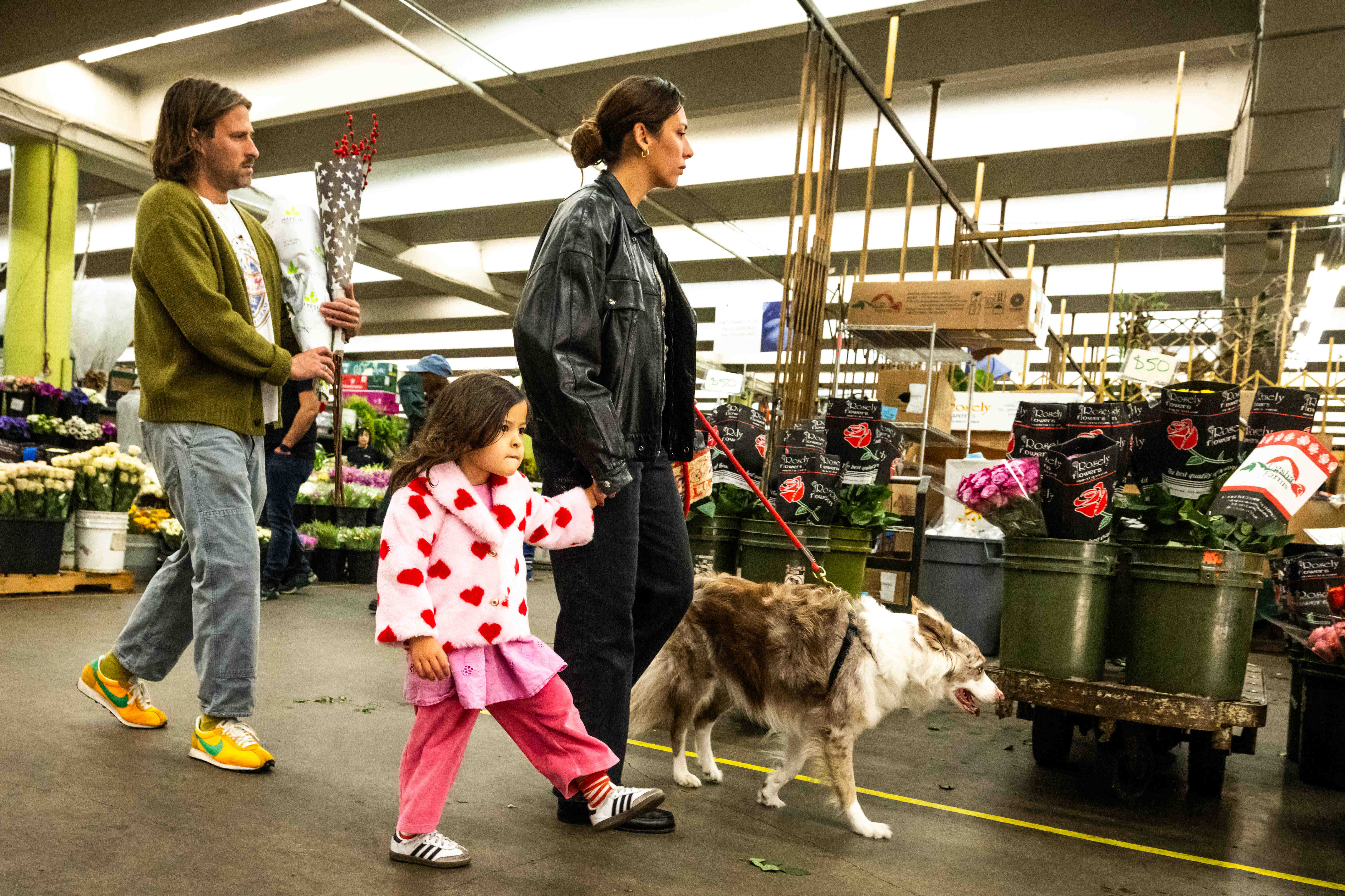 Kanani Miller, 2, of Highland Park, and her parents Ryan...