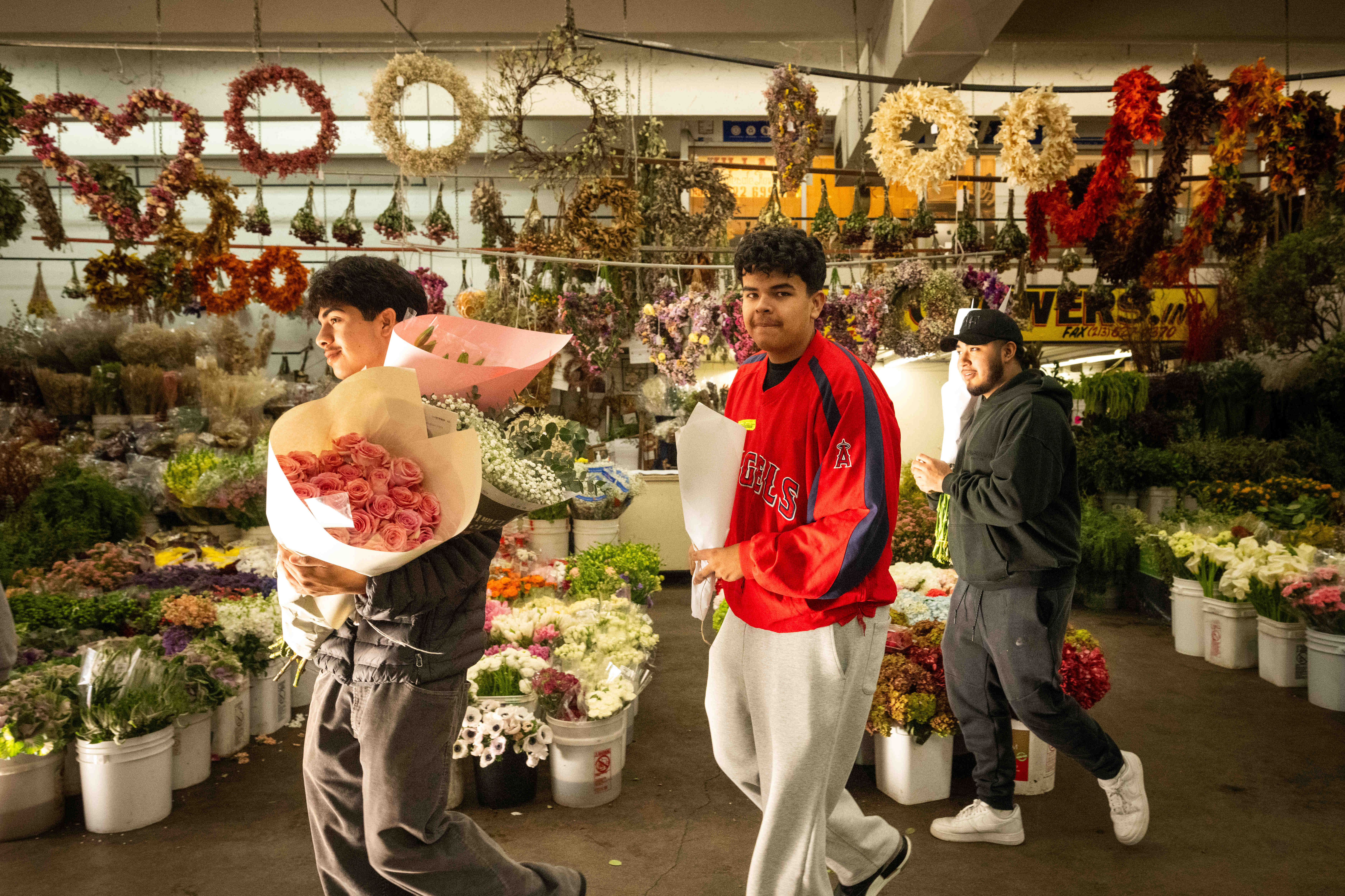 Young men make their way through the Southern California Flower...