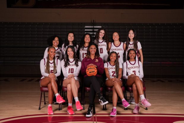 The Bishop's School girls basketball team is pictured with head coach Paris Johnson. (Dune Media)