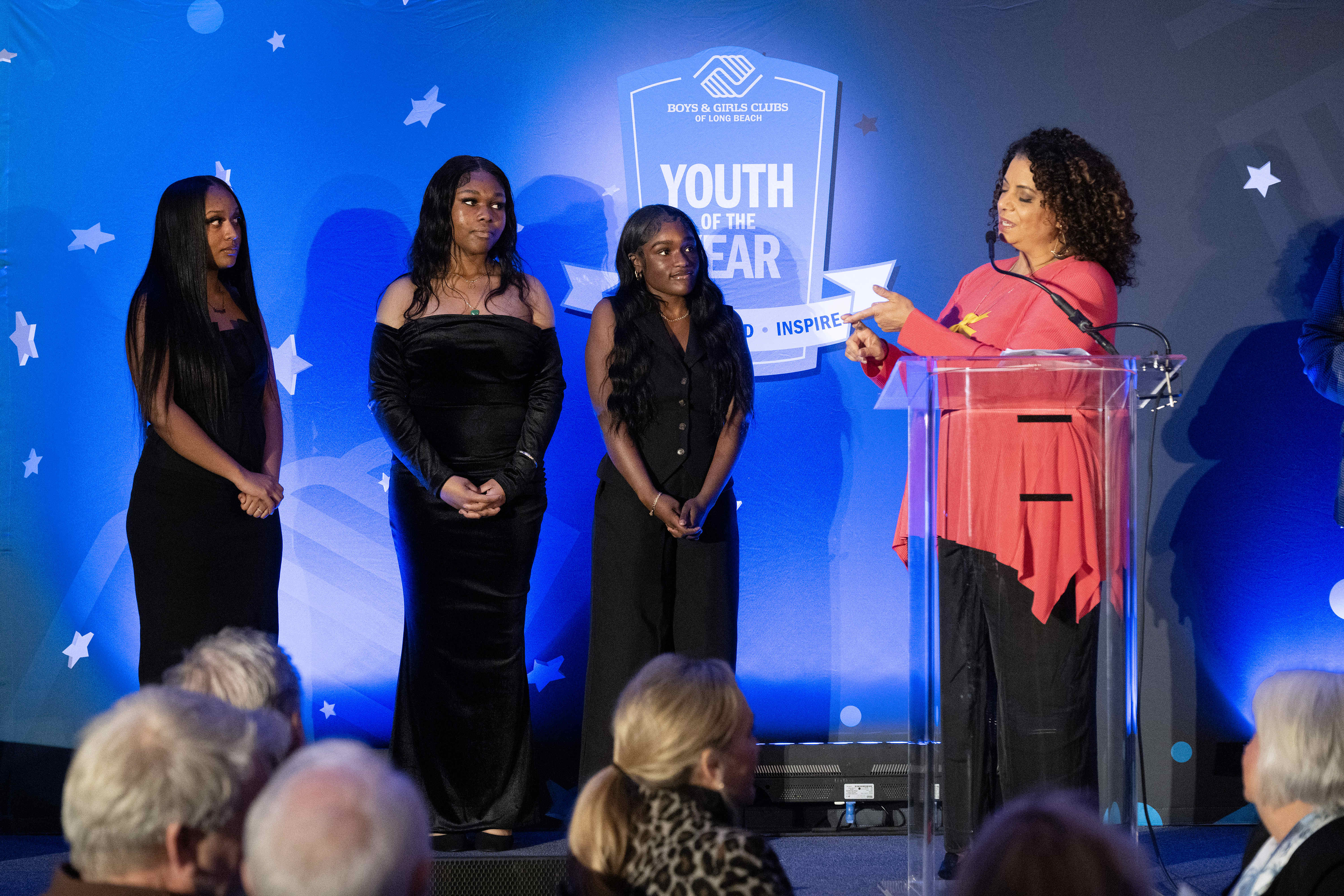 Master of ceremonies Michaela Pereira, right, on stage with the...