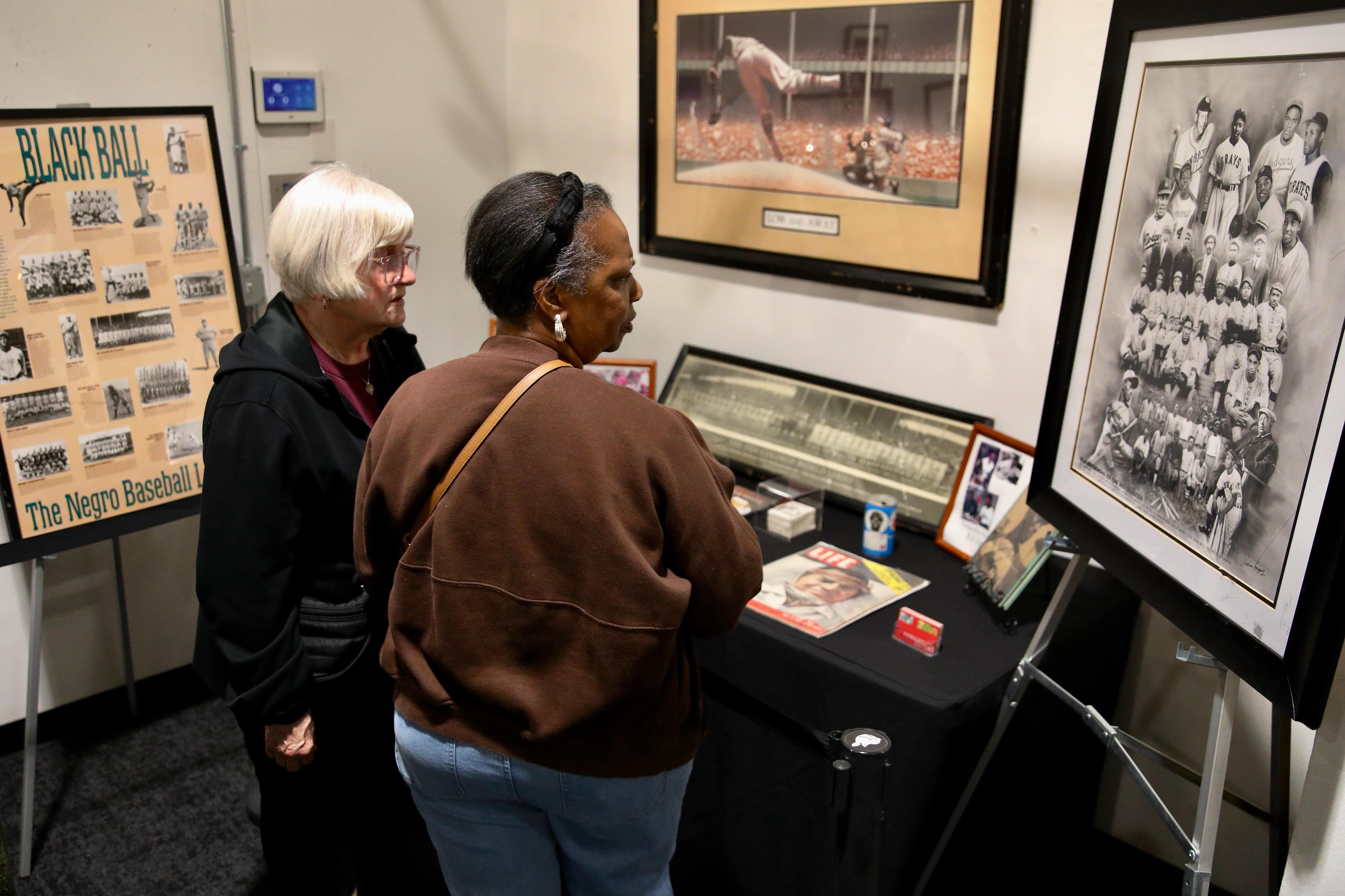 Attendees check out historical and cultural displays at the Black...