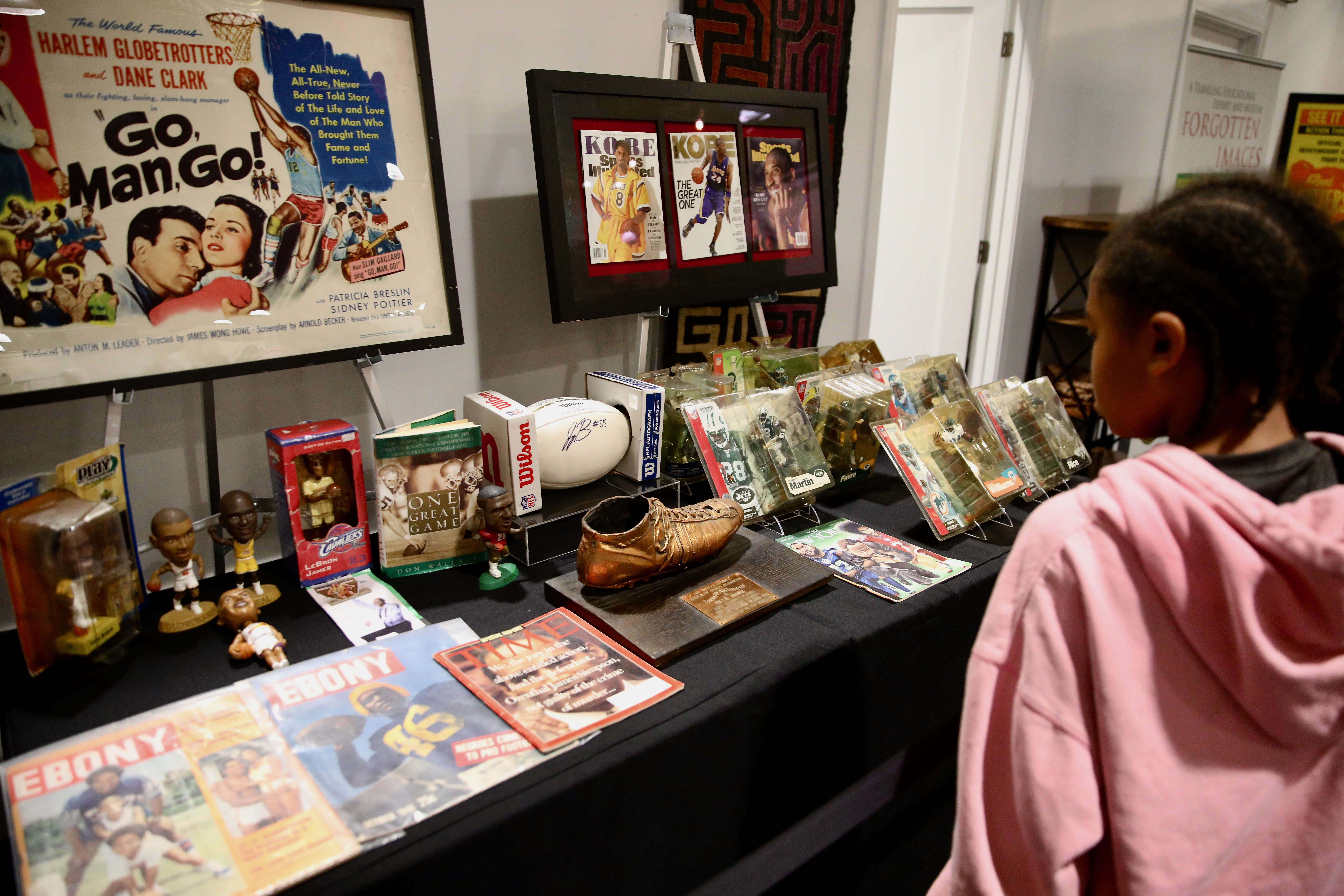 Attendees check out historical and cultural displays at the Black...