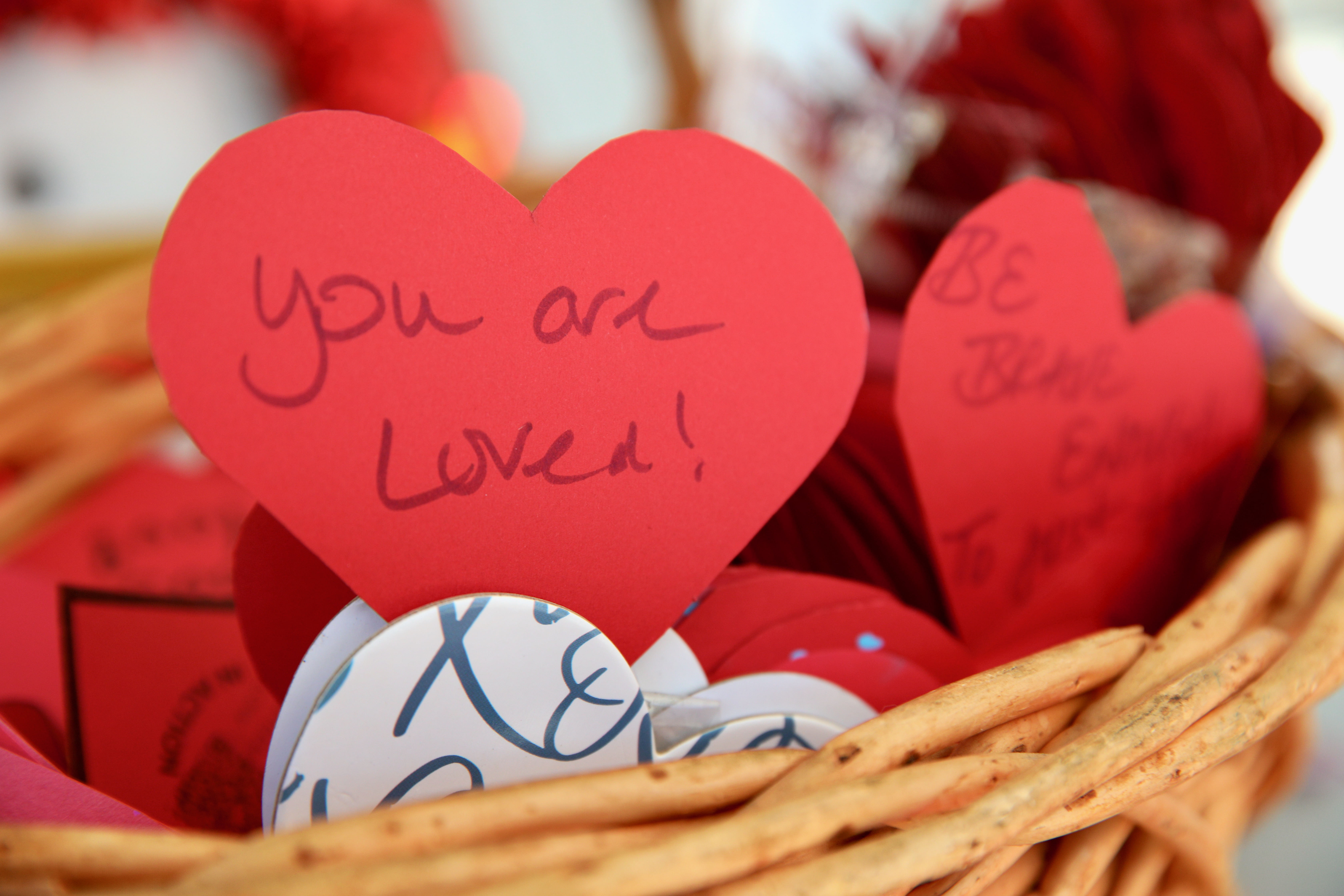 Christian Outreach in Action of Long Beach distributes paper hearts...