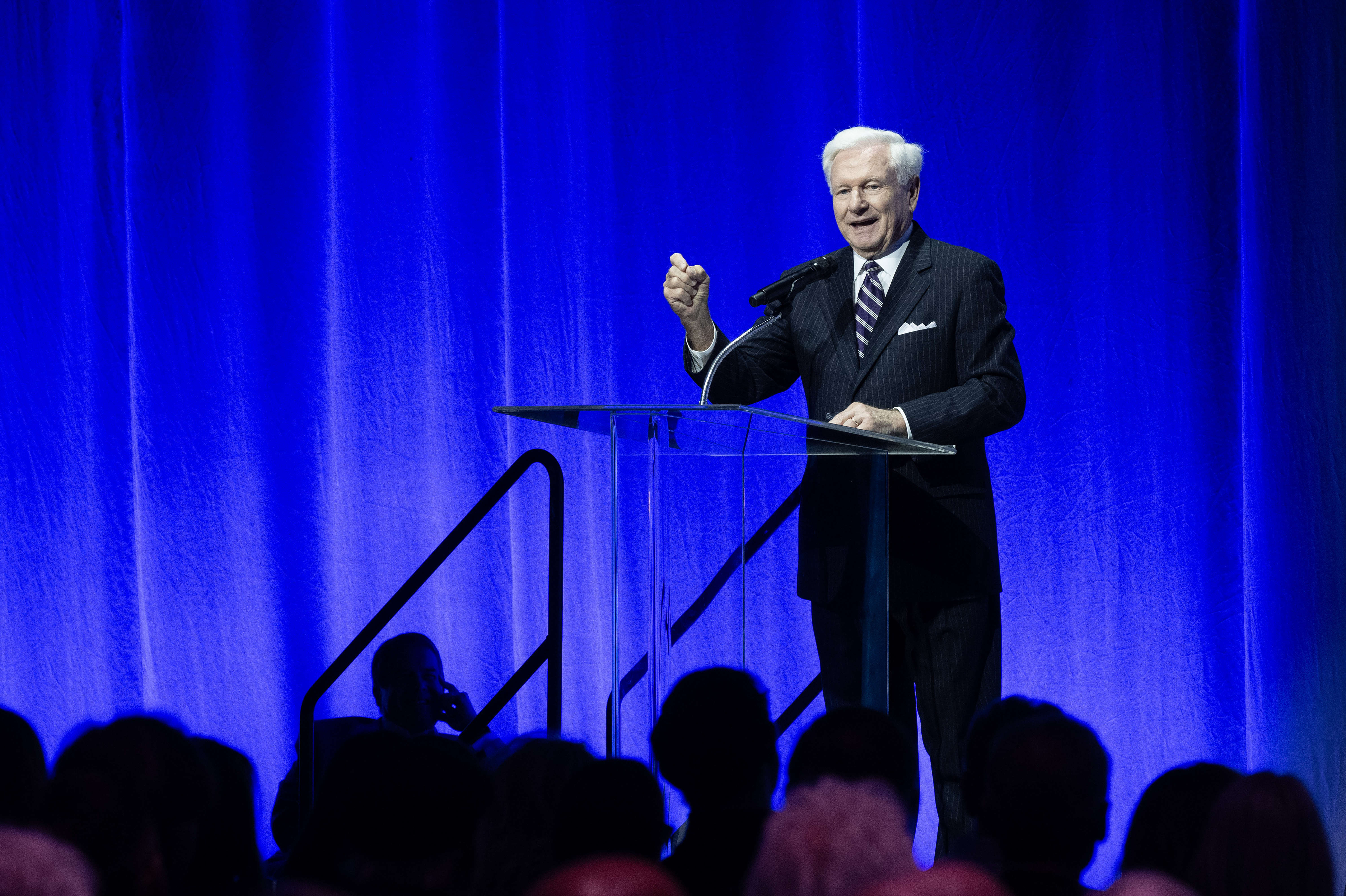 Mike Roos speaks during former Mayor Bob Fosterâs celebration of...