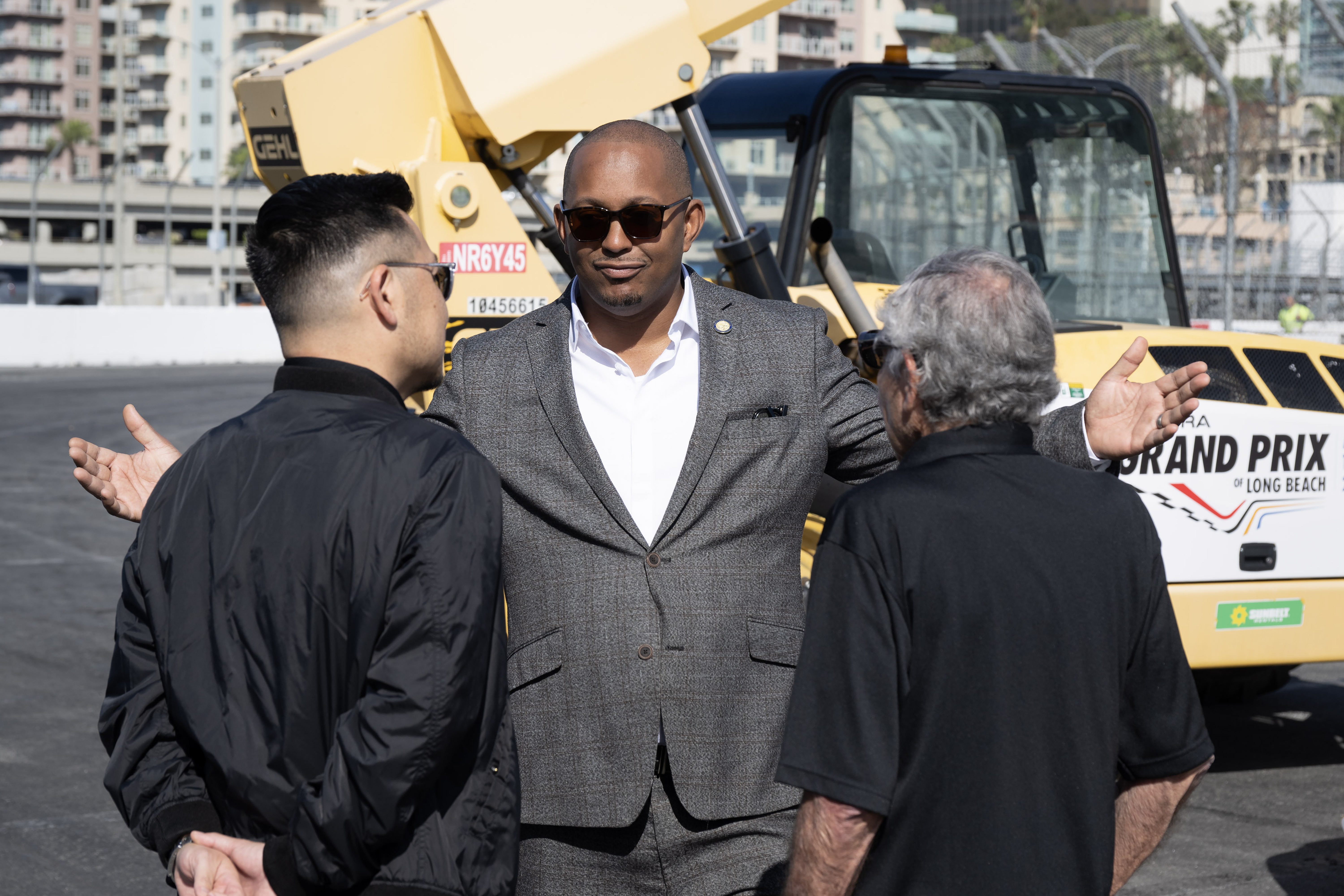 From left, General Manager Jim Liaw, Mayor Rex Richardson and...