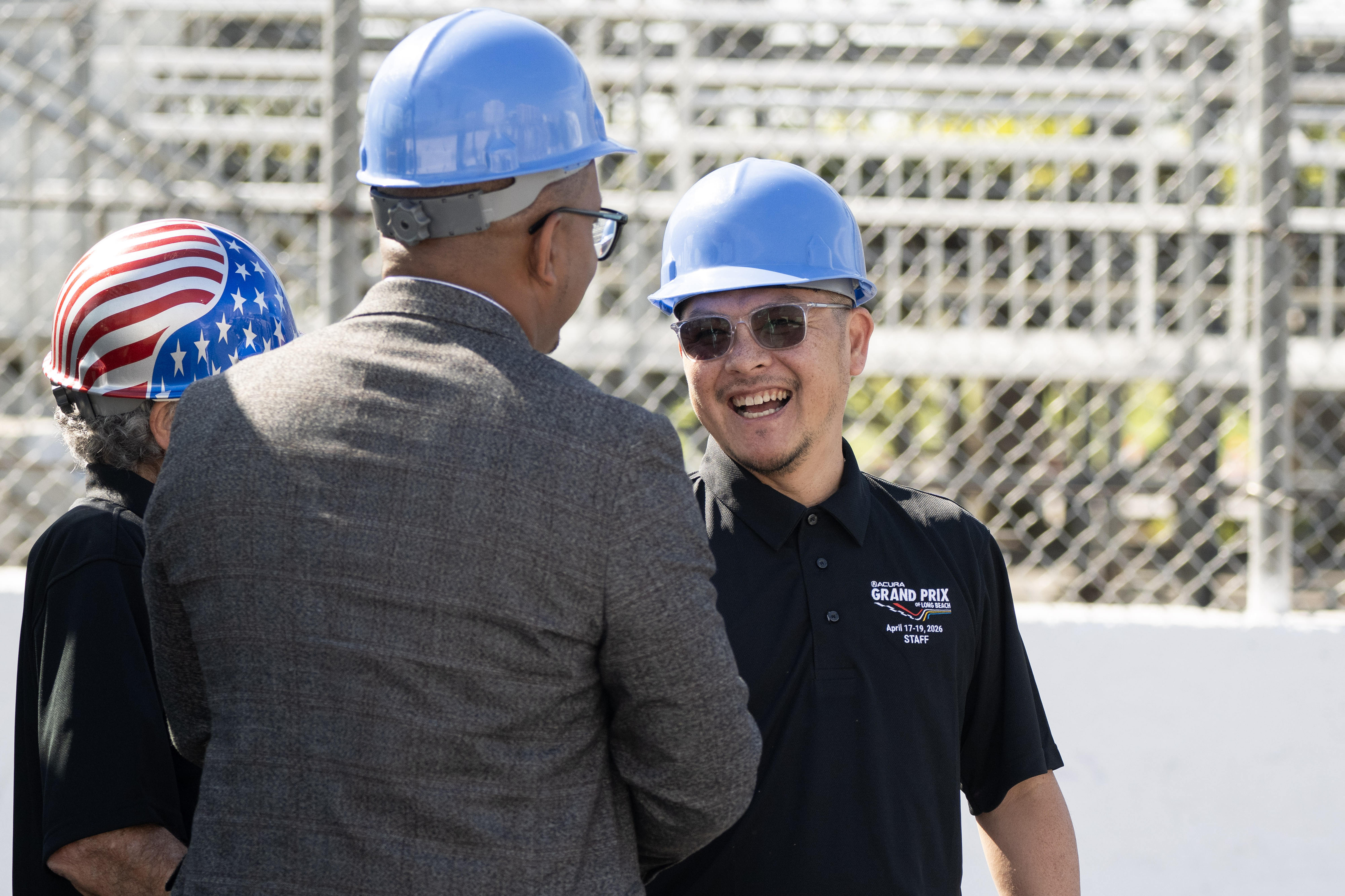 From right, General Manager Jim Liaw, Mayor Rex Richardson and...